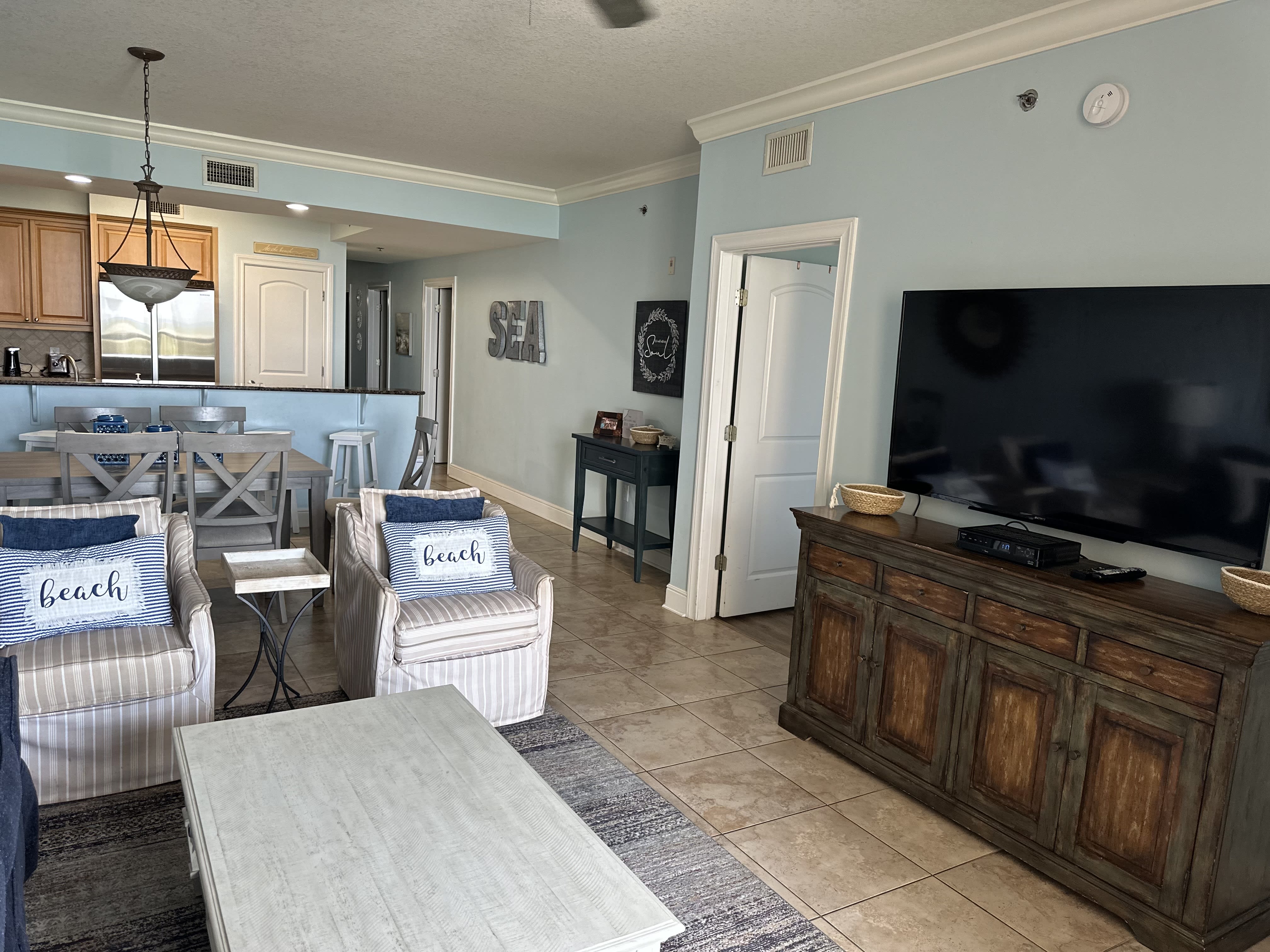 LIVING ROOM LOOKING TO DINING/KITCHEN COMBO