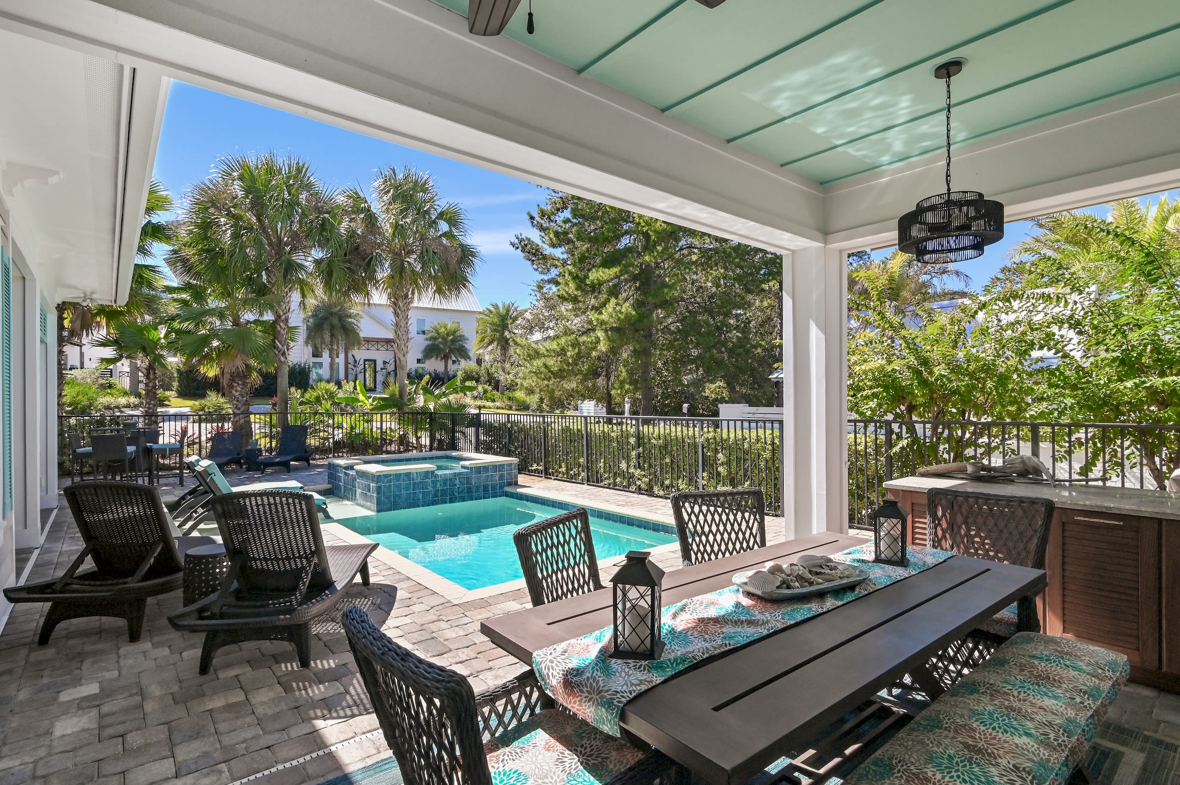 Outside dining table to seat 8, bar counter-height table on deck to seat four