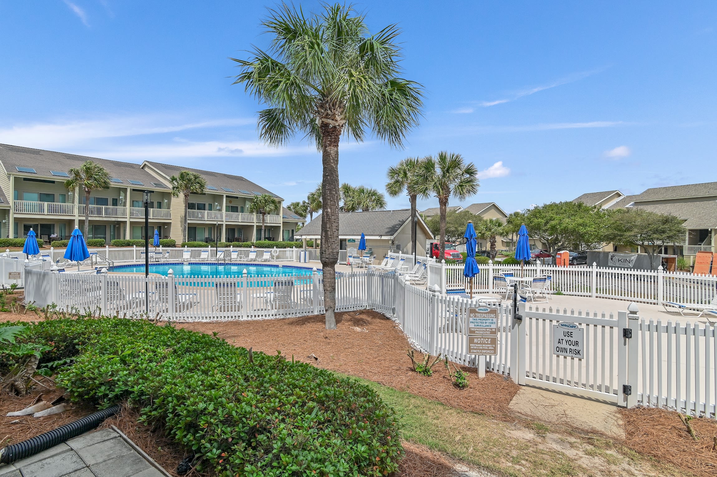 One of five available pools is just steps off your patio