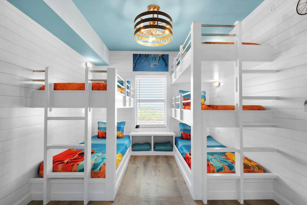 Bunk room with 5 Twin XL bunks, lights and outlets for each bunk