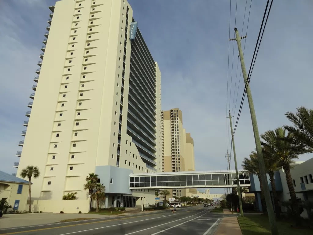 Street side view of Sterling Breeze showing covered walkway to garage.
