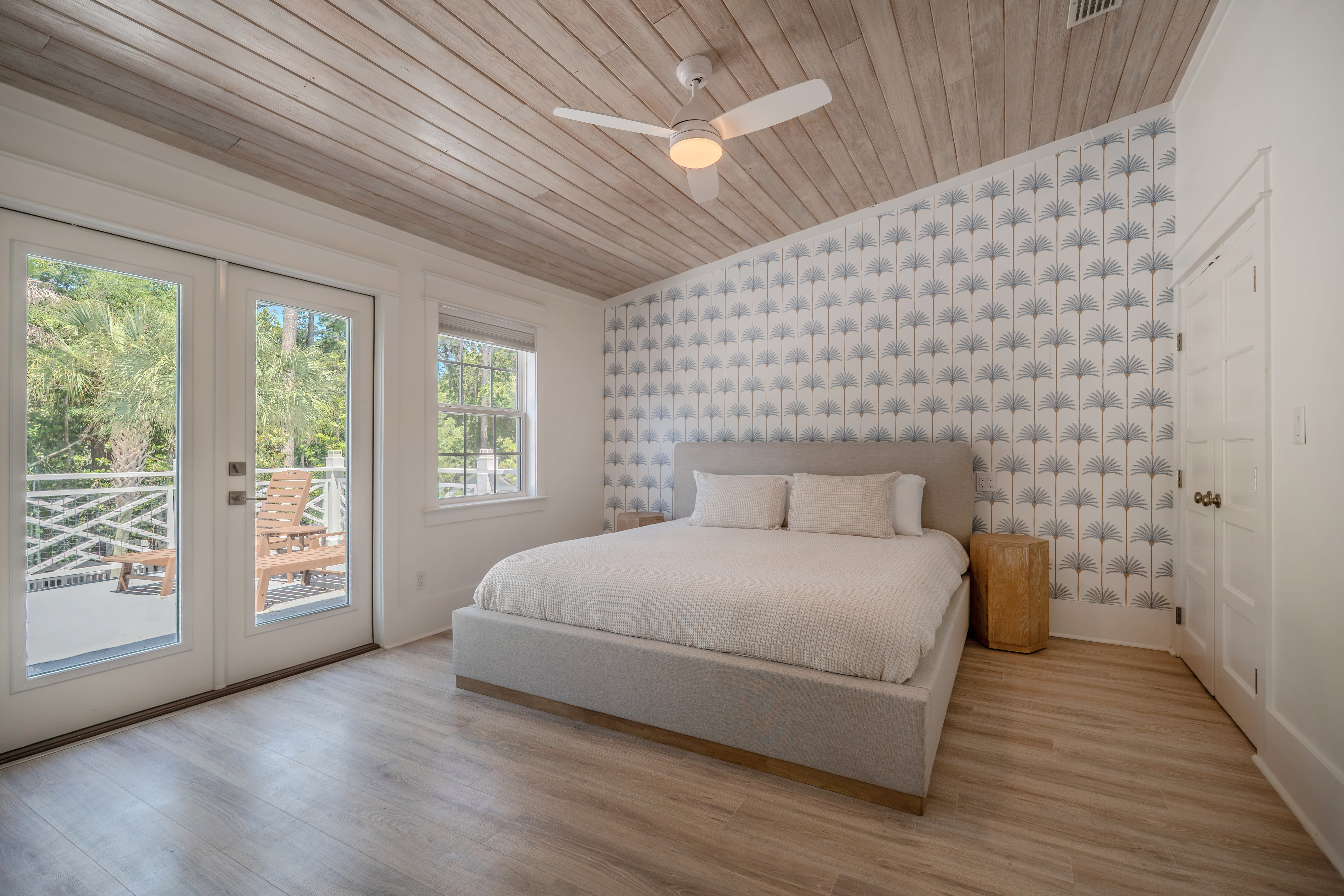 Primary Suite 1 with luxurious king bed and private deck