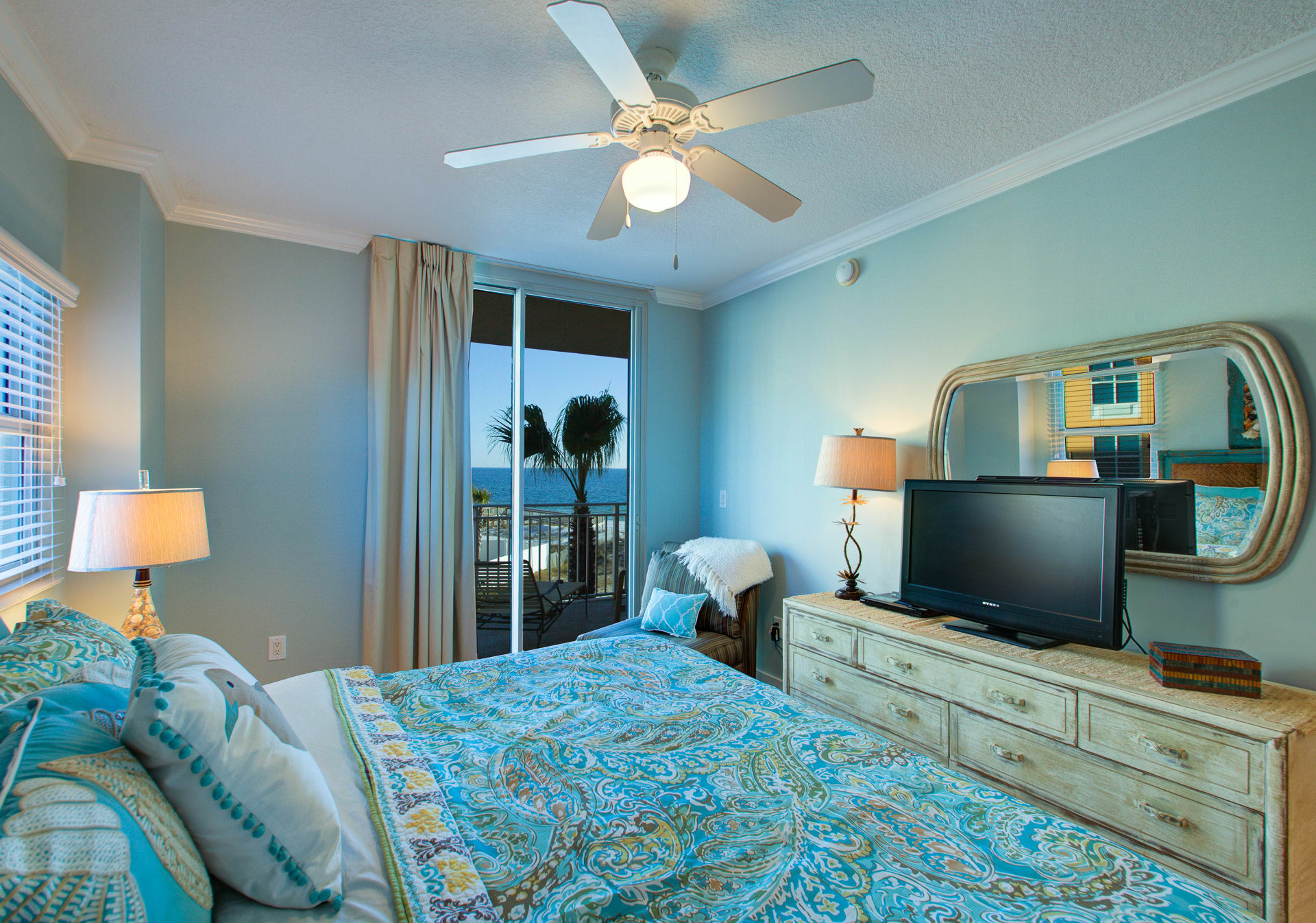 Enjoy the gorgeous beach views from this k master; see door to patio.