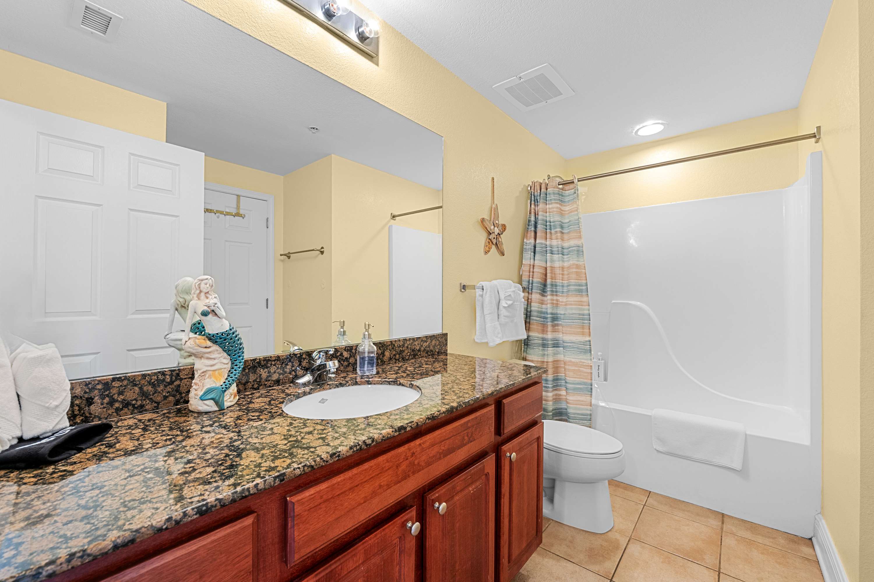 2nd bathroom with shower and tub