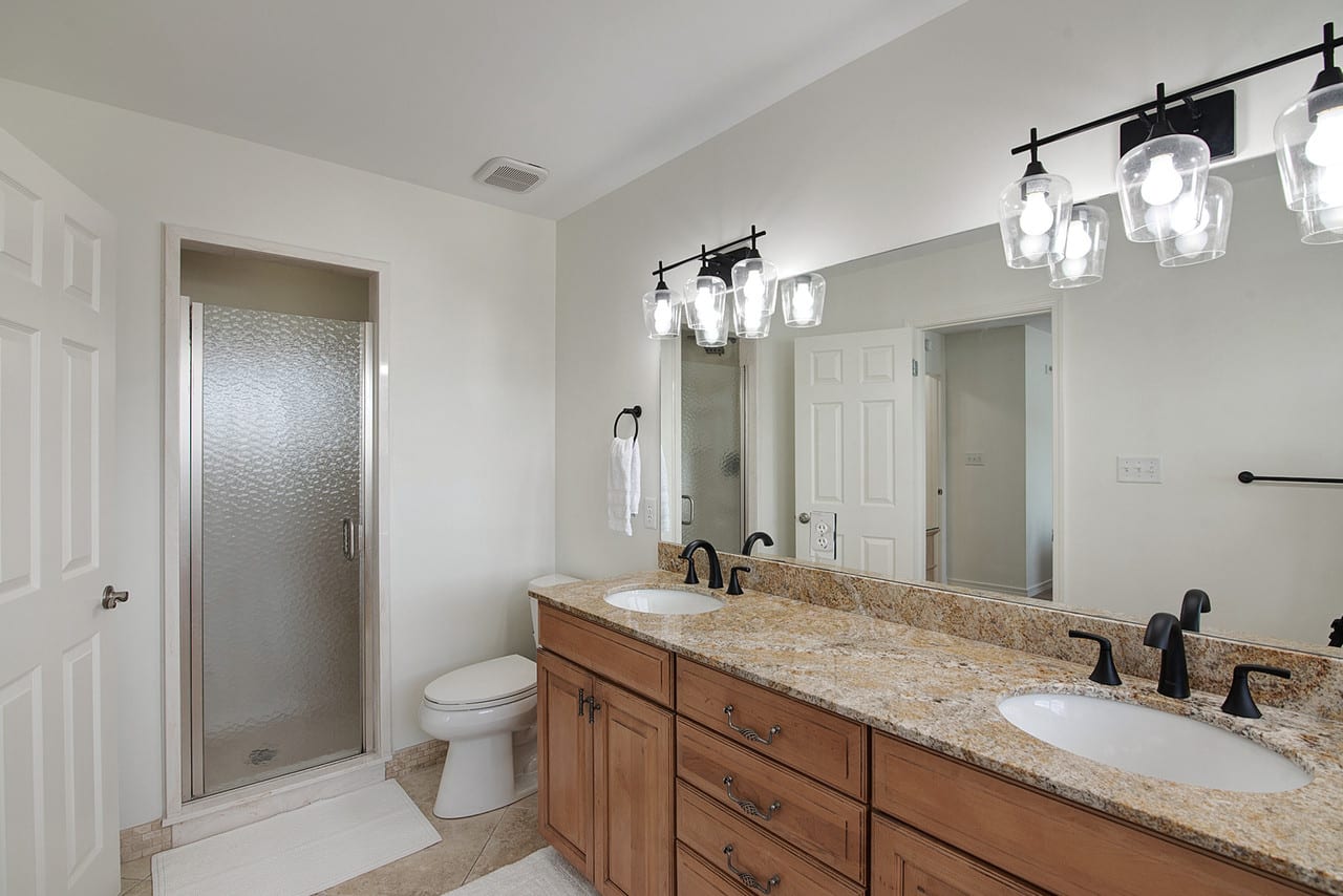 Large upper level bathroom with walk-in shower.