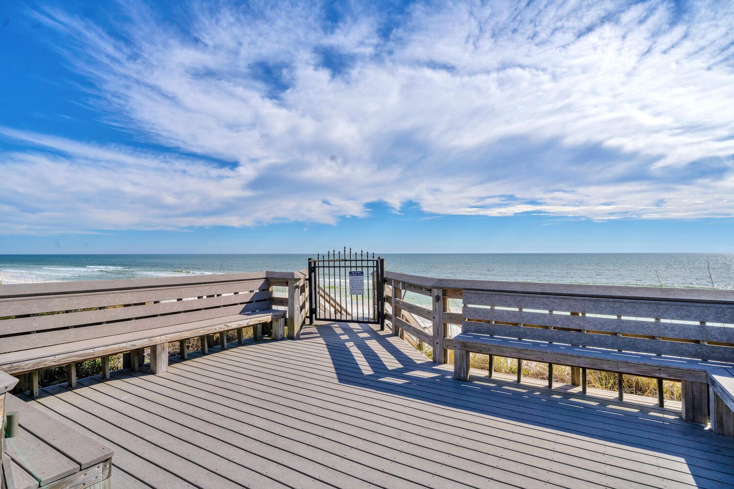 Deck seating overlooking the beautiful beach