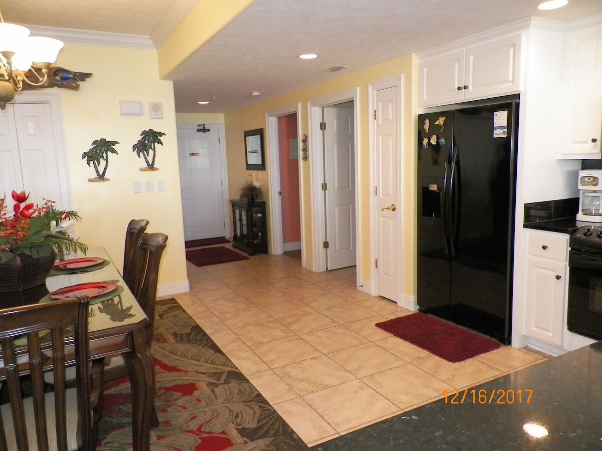 A VIEW FROM THE KITCHEN LOOKING TOWARD THE CONDO FRONT ENTRANCE