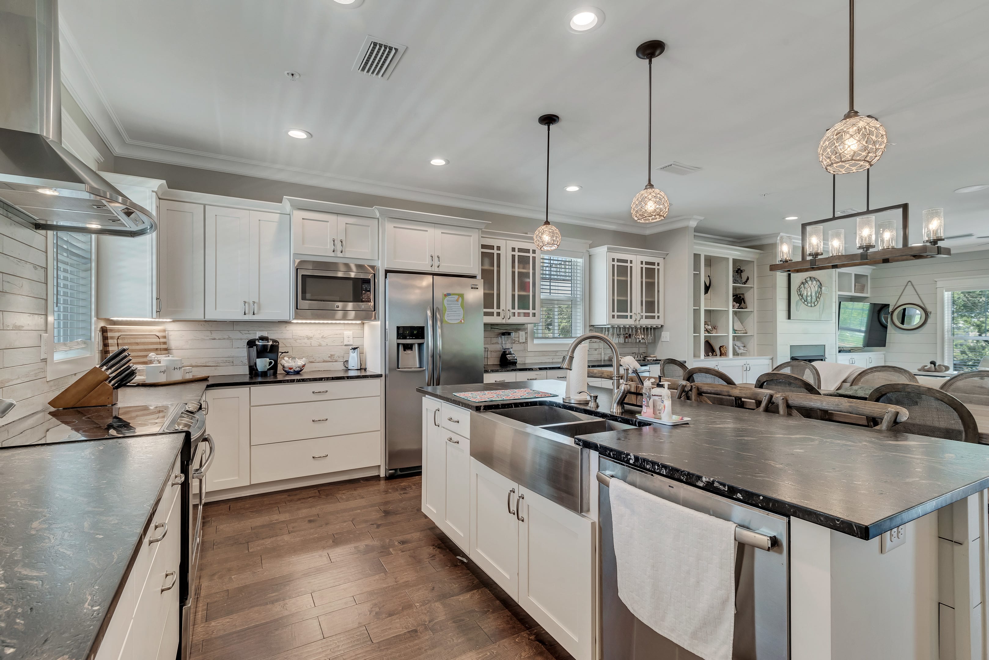 Large Kitchen stocked with plenty of dishes and cookware 