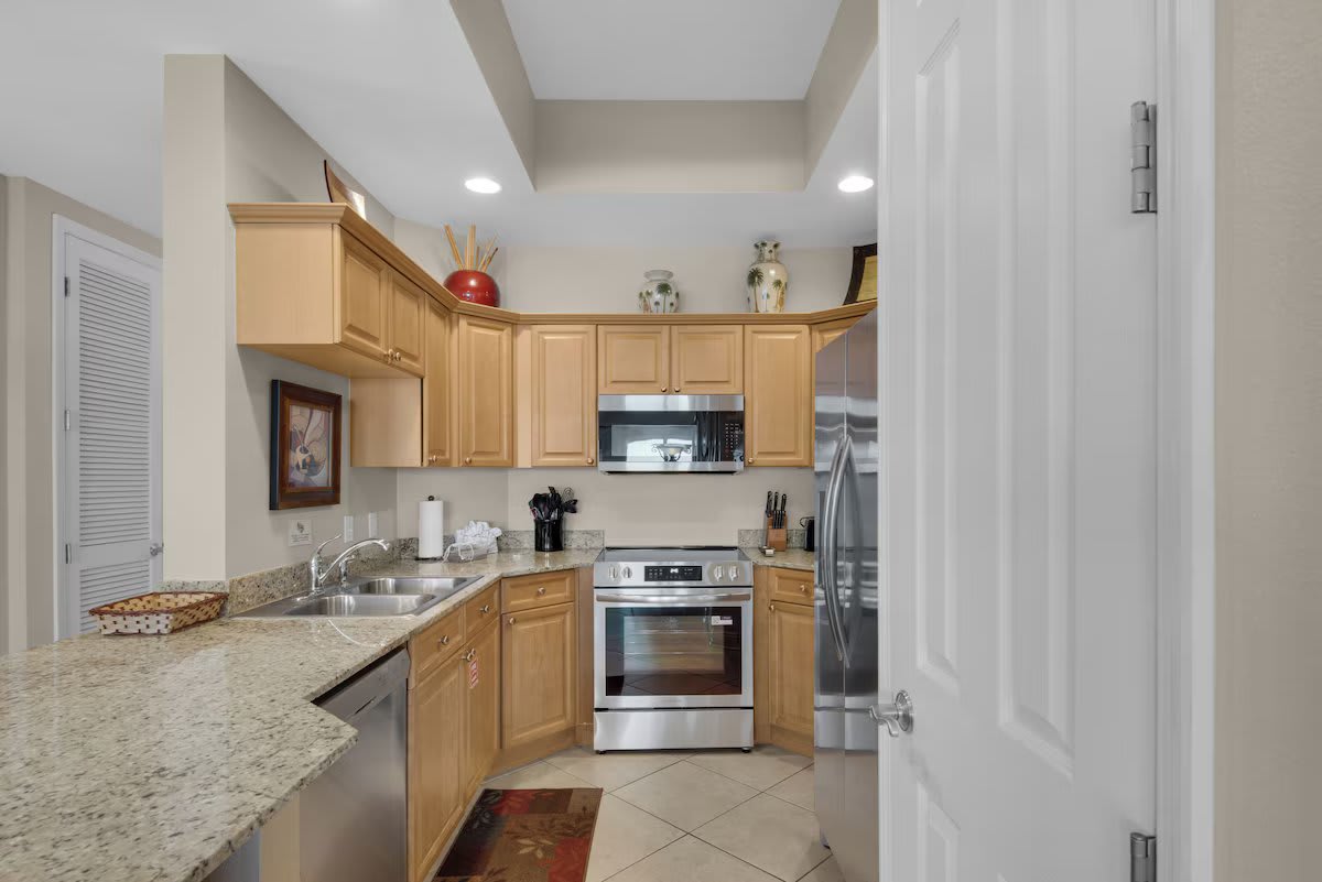 Kitchen with solid surface counters and new appliances!