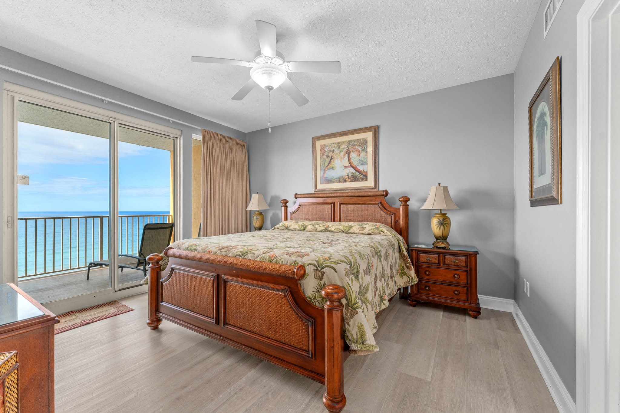 Master bedroom with access to balcony and master bath