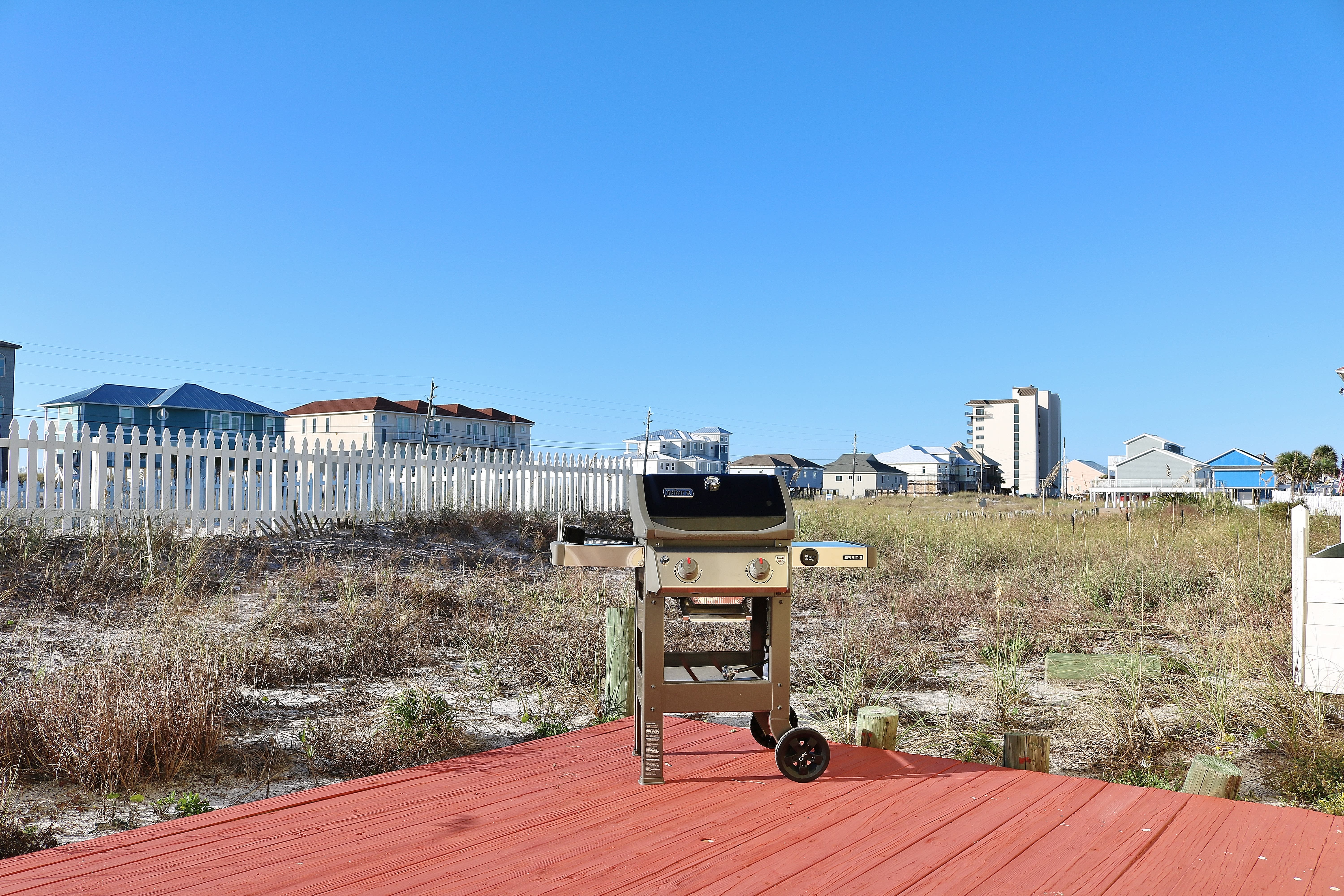 Grill for your guests on the back patio.