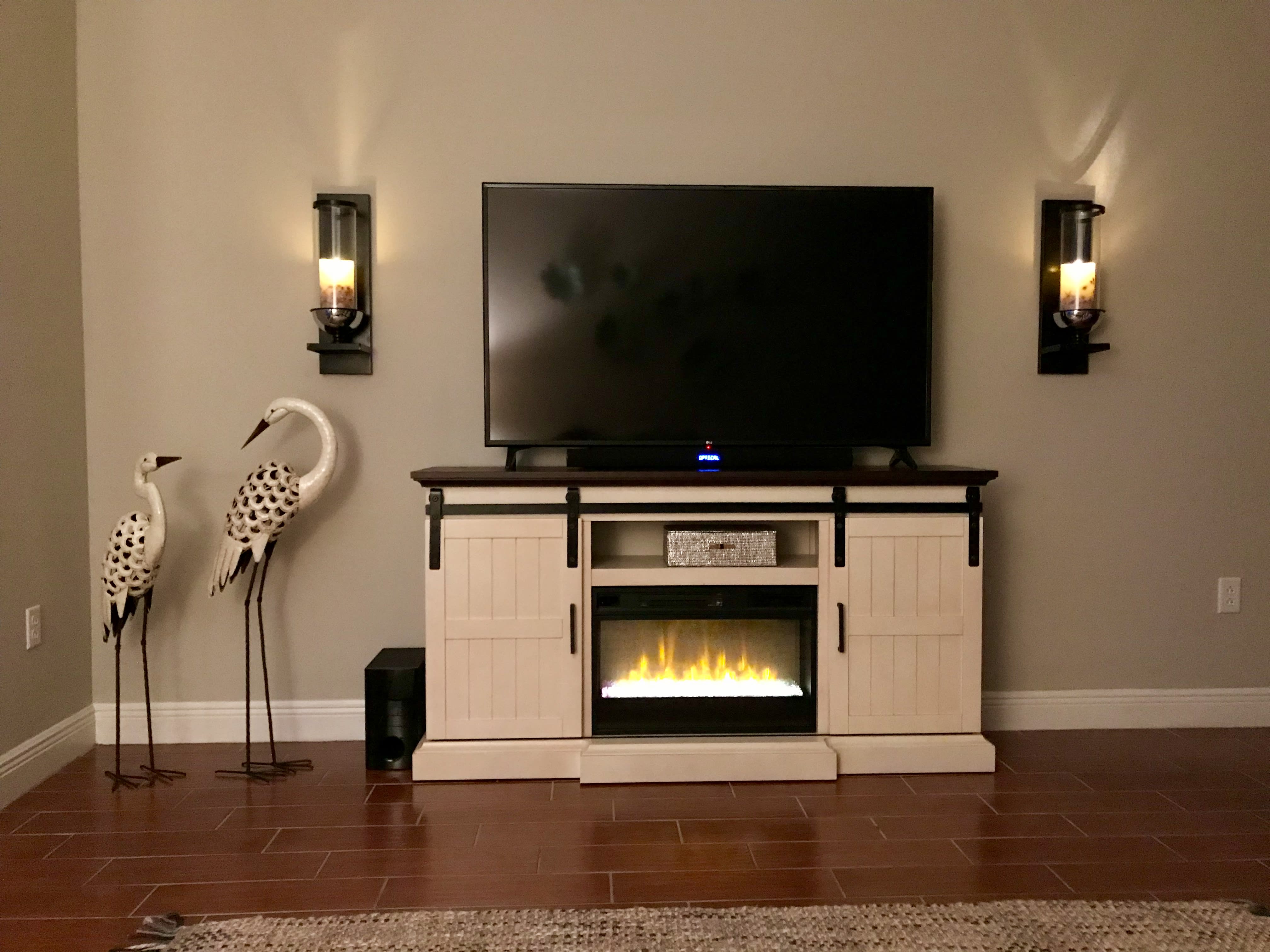 60 inch HD TV and yes, that is a fireplace!