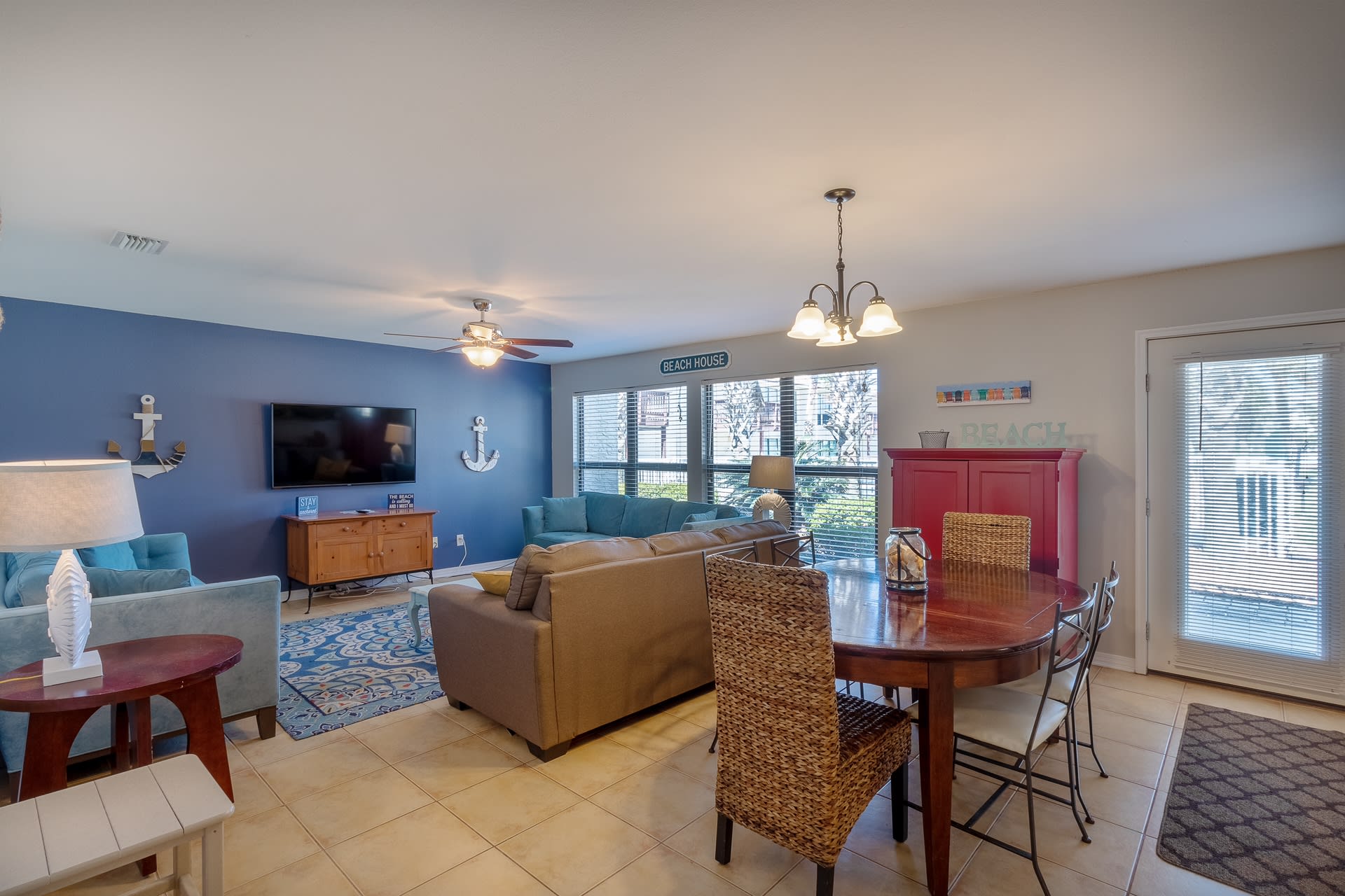 Main level family/dining room.  Back patio faces the inground pool