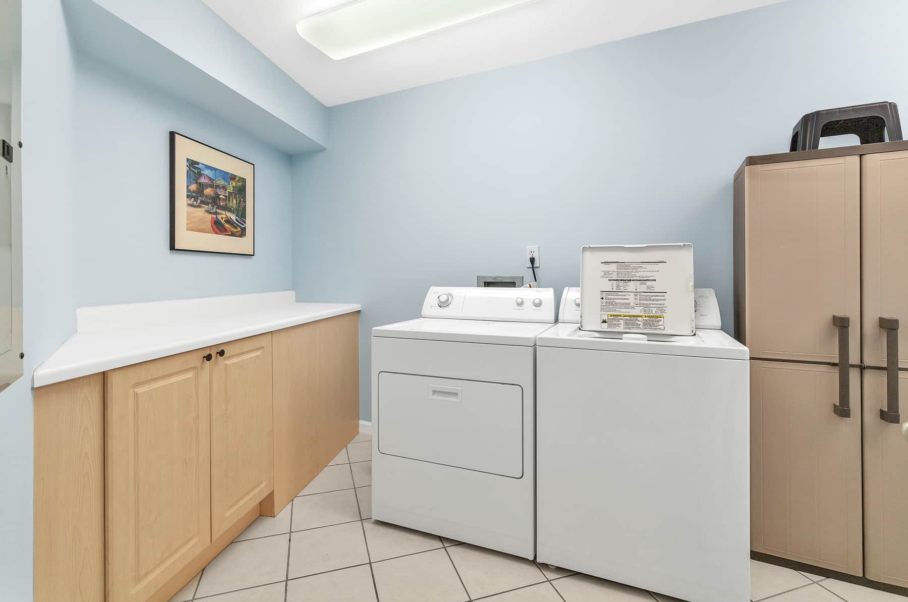 large laundry room with storage space!