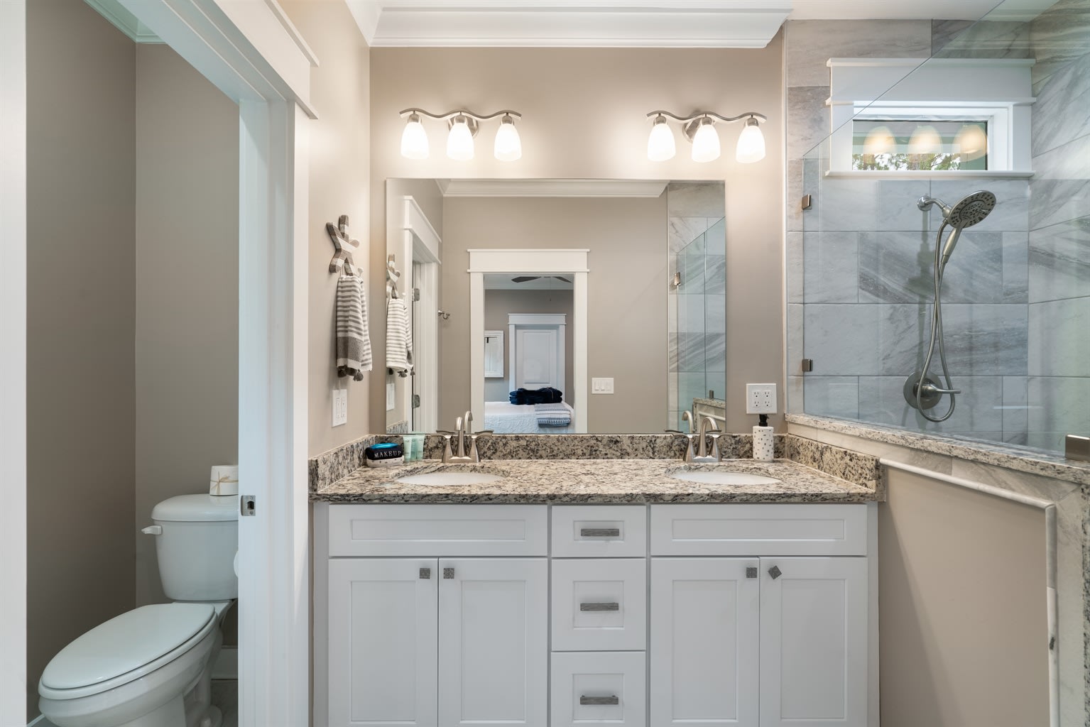 Master Bath to Coastal Navy Room