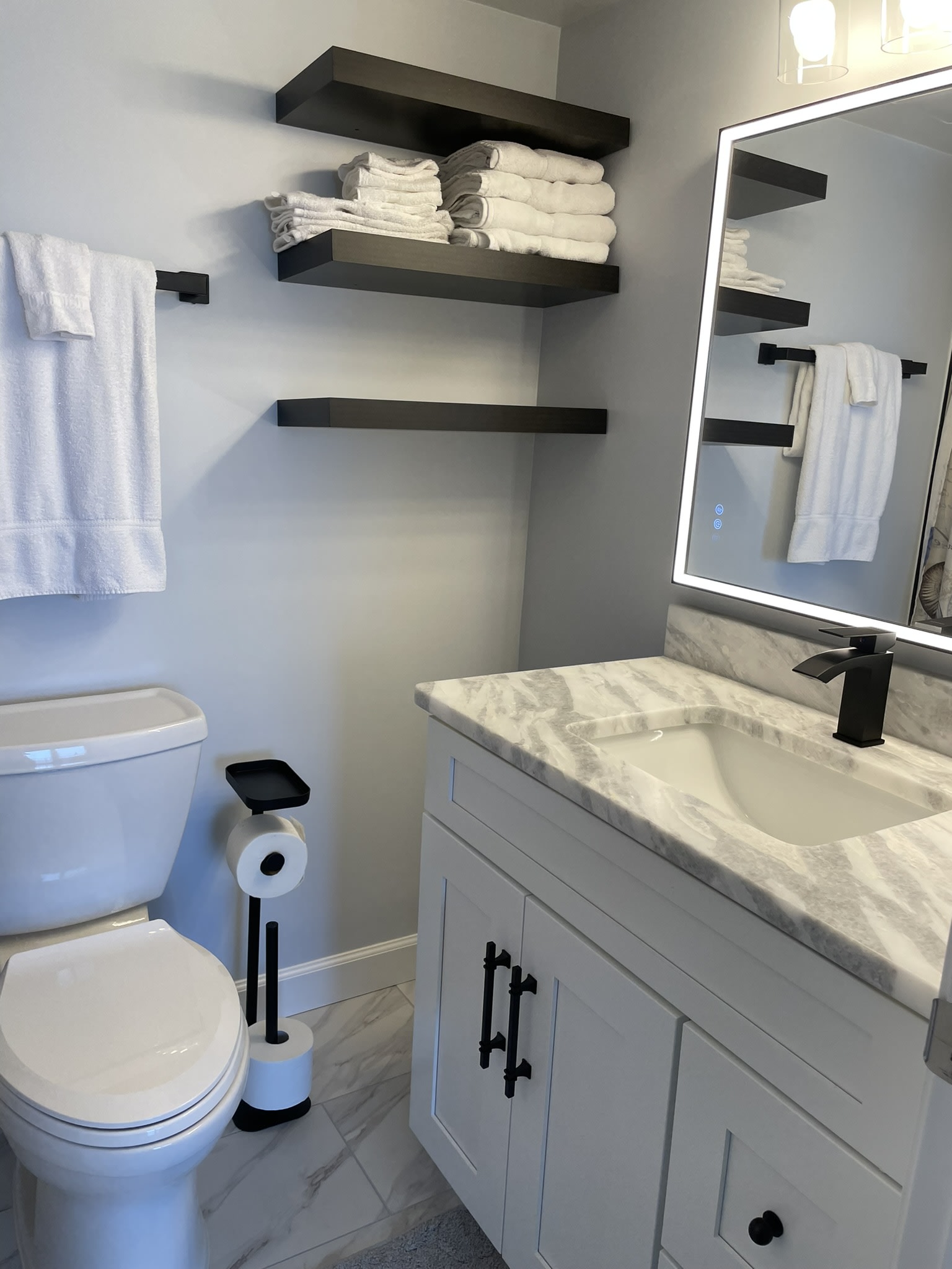 The newly remodeled master bath includes tub and shower combo. 