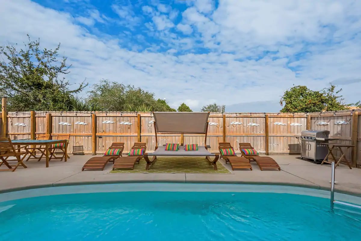 Freestyle-3 Ready to take a break from the waves? Cool off in Freestyle's full sized pool with fenced grilling and outdoor dining area.