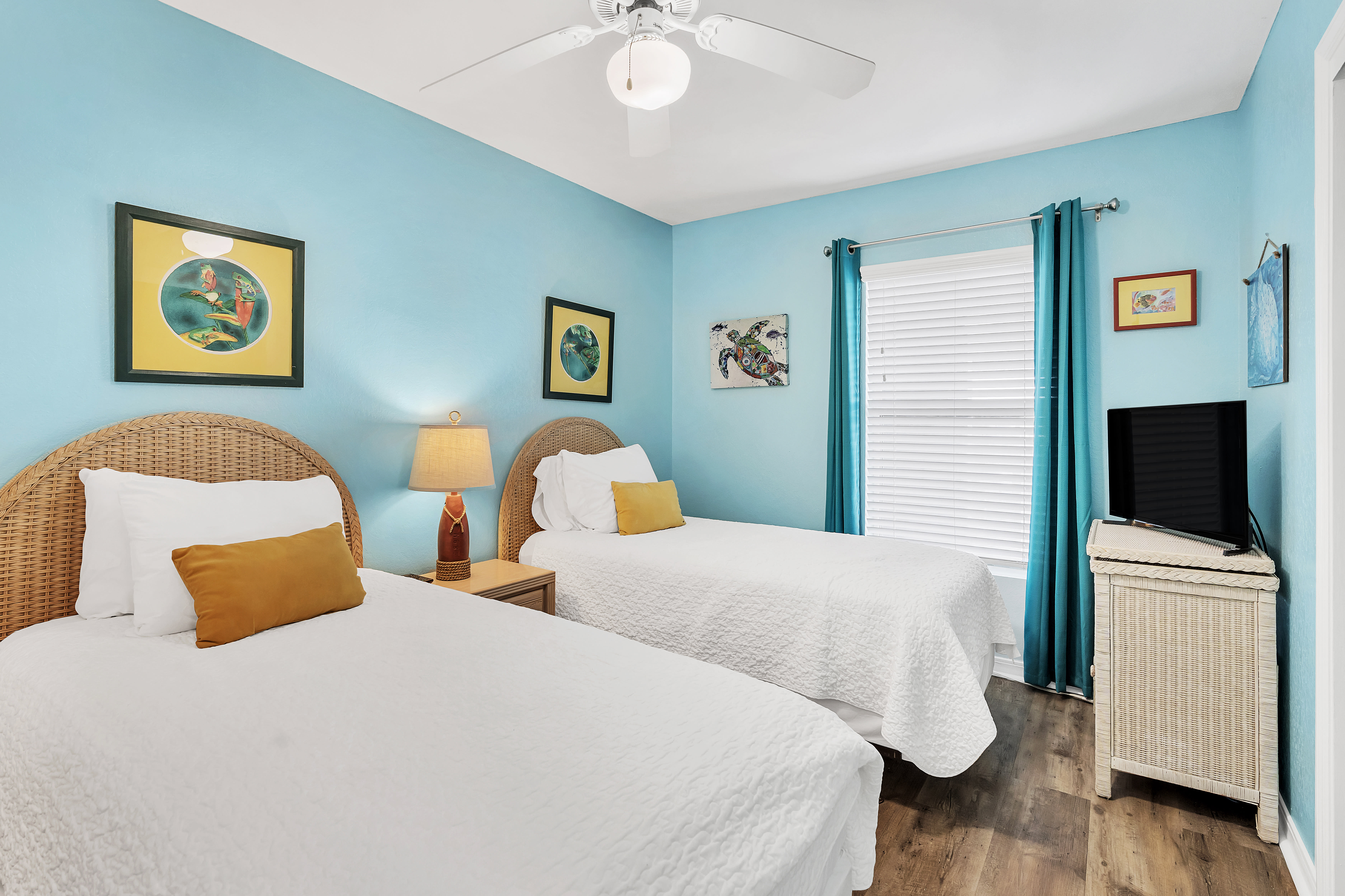 Second bedroom with two twin beds.