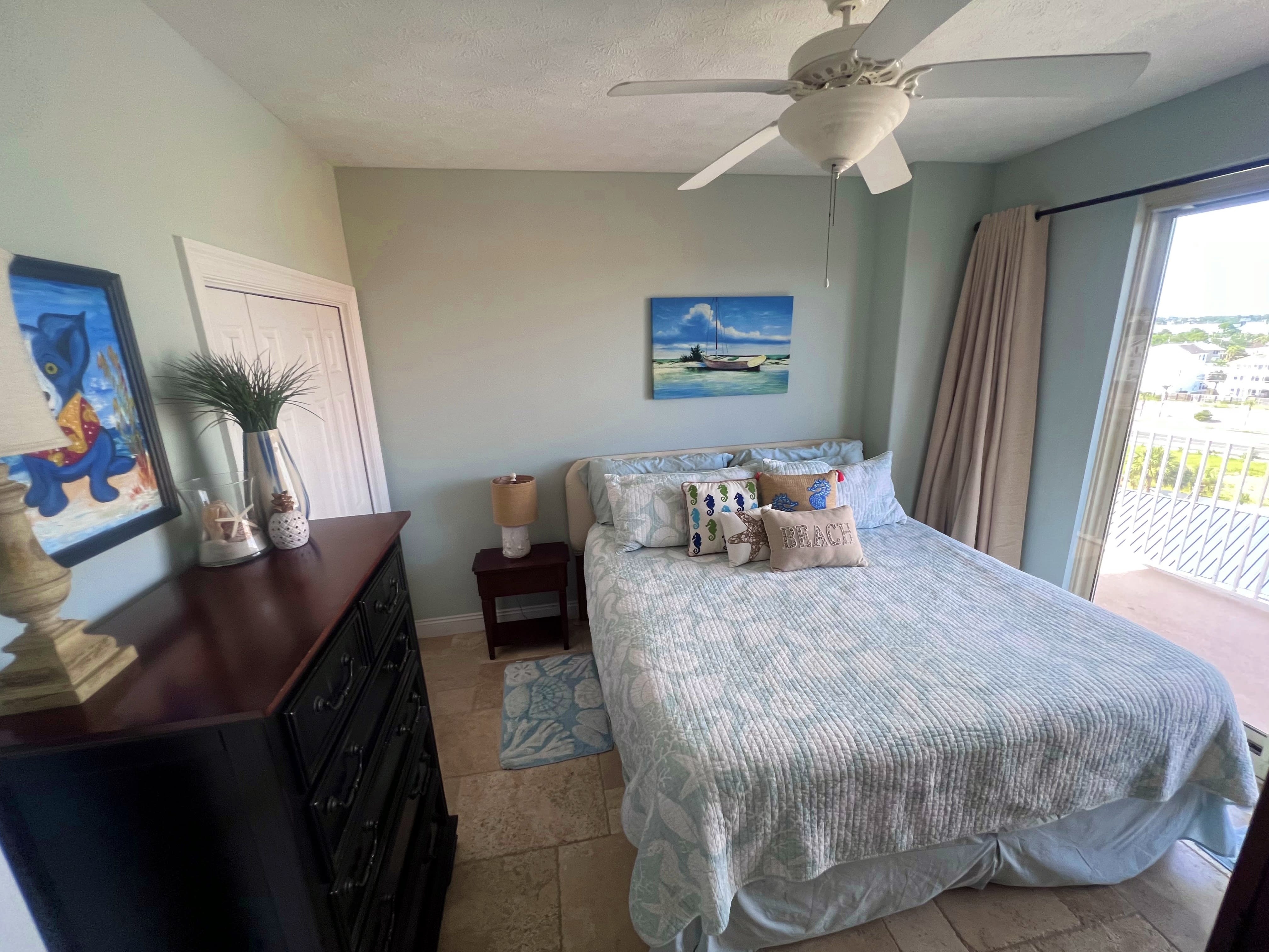 Guest bedroom 2 with King Bed, Smart TV, DVD player and balcony access