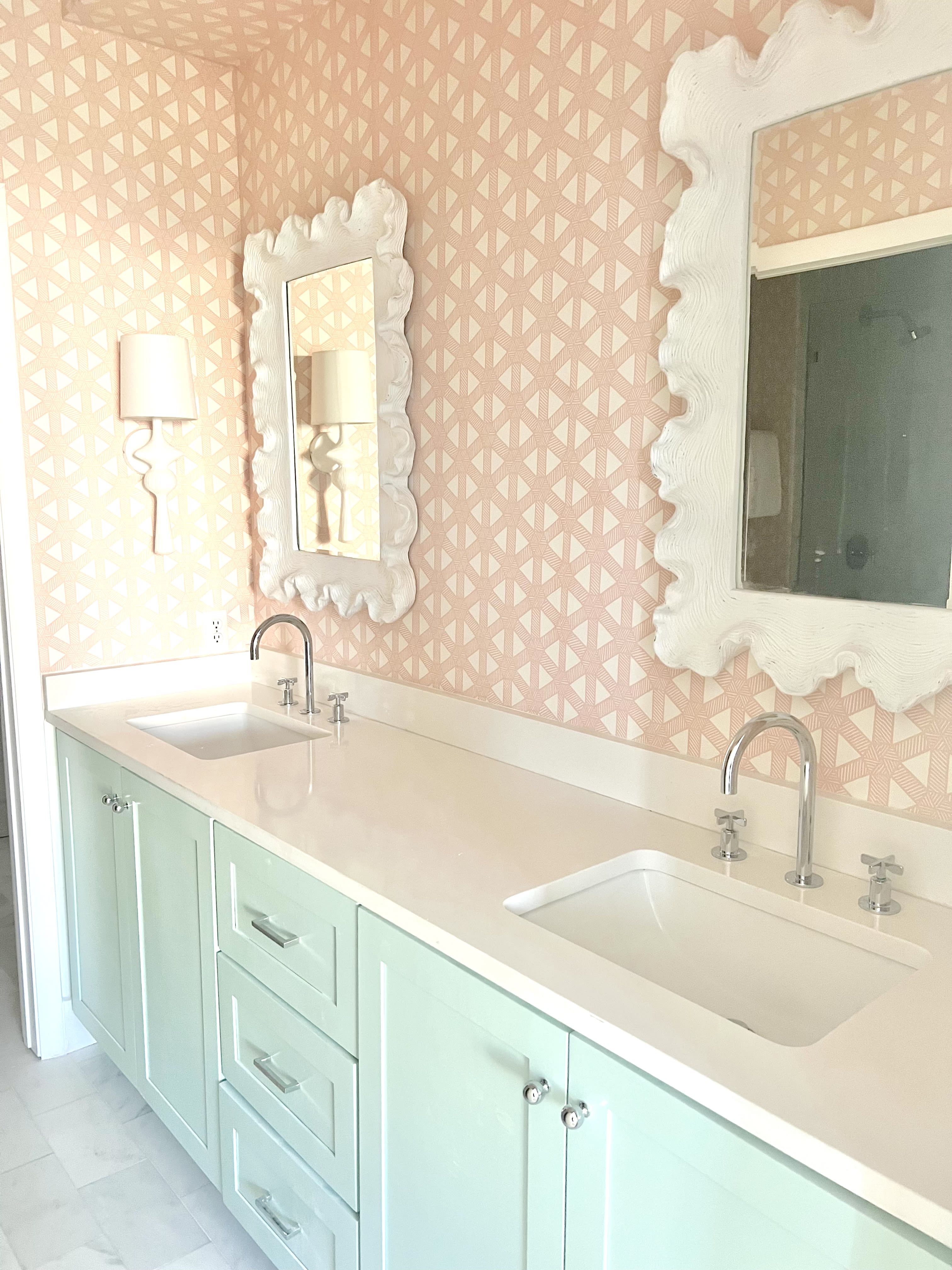 Master bathroom features his and hers sinks and large walk in closet.