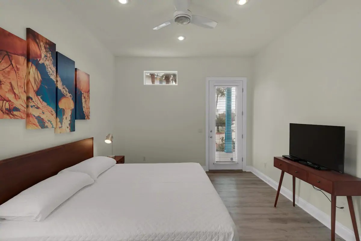 Aqua-12 Clean lines and premium mattress in our downstairs master king suite.