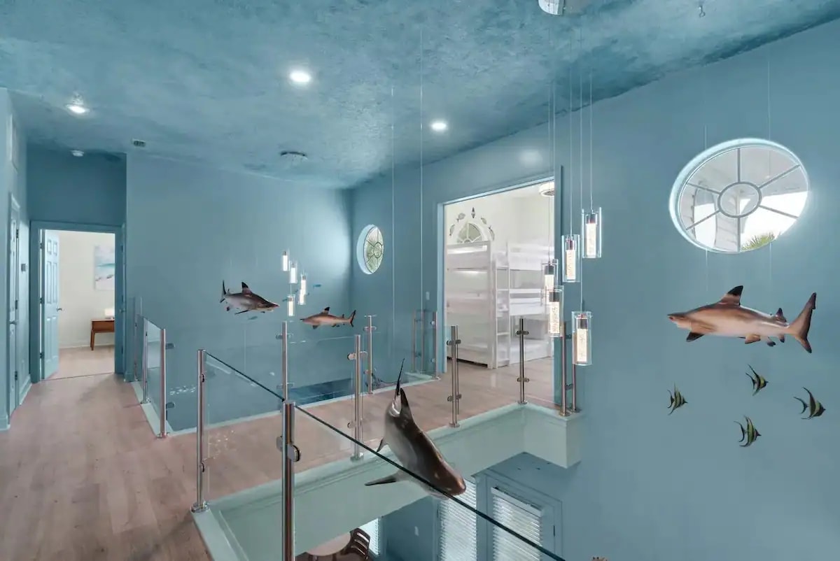 Aqua-17 The kiddos will have to walk the glass bridge to get to the loft bunkroom.