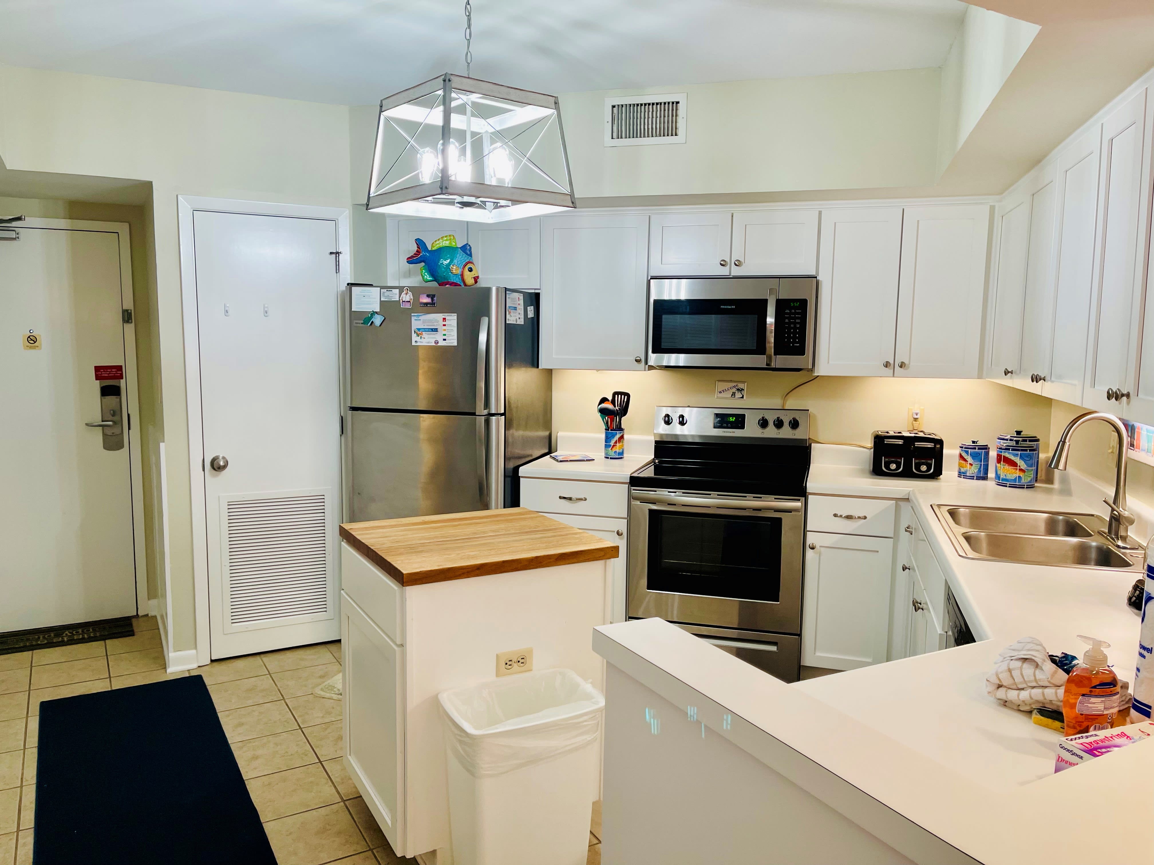 All new appliances and kitchen cabinets in the fully stocked kitchen!