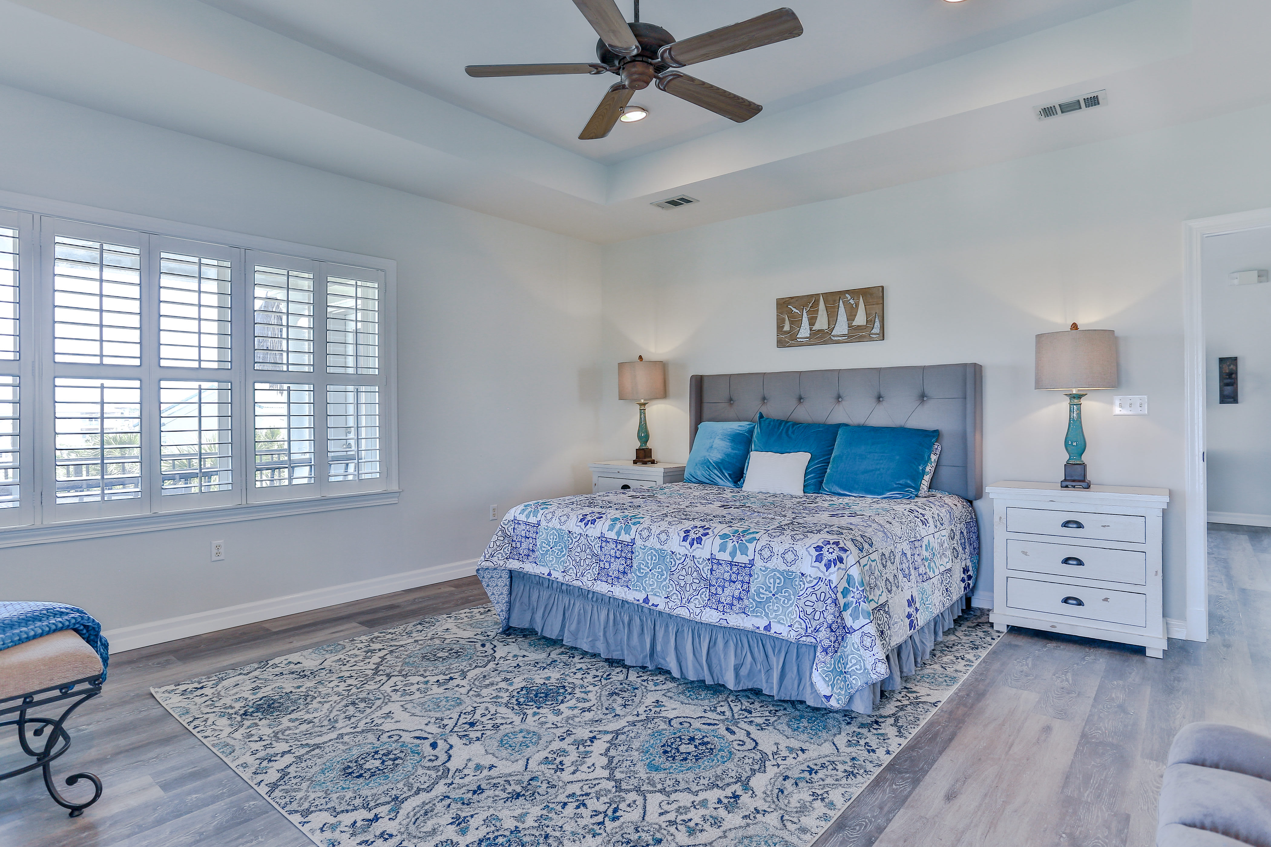 3rd floor ensuite with lake views, king bed, bath has shower and jetted tub