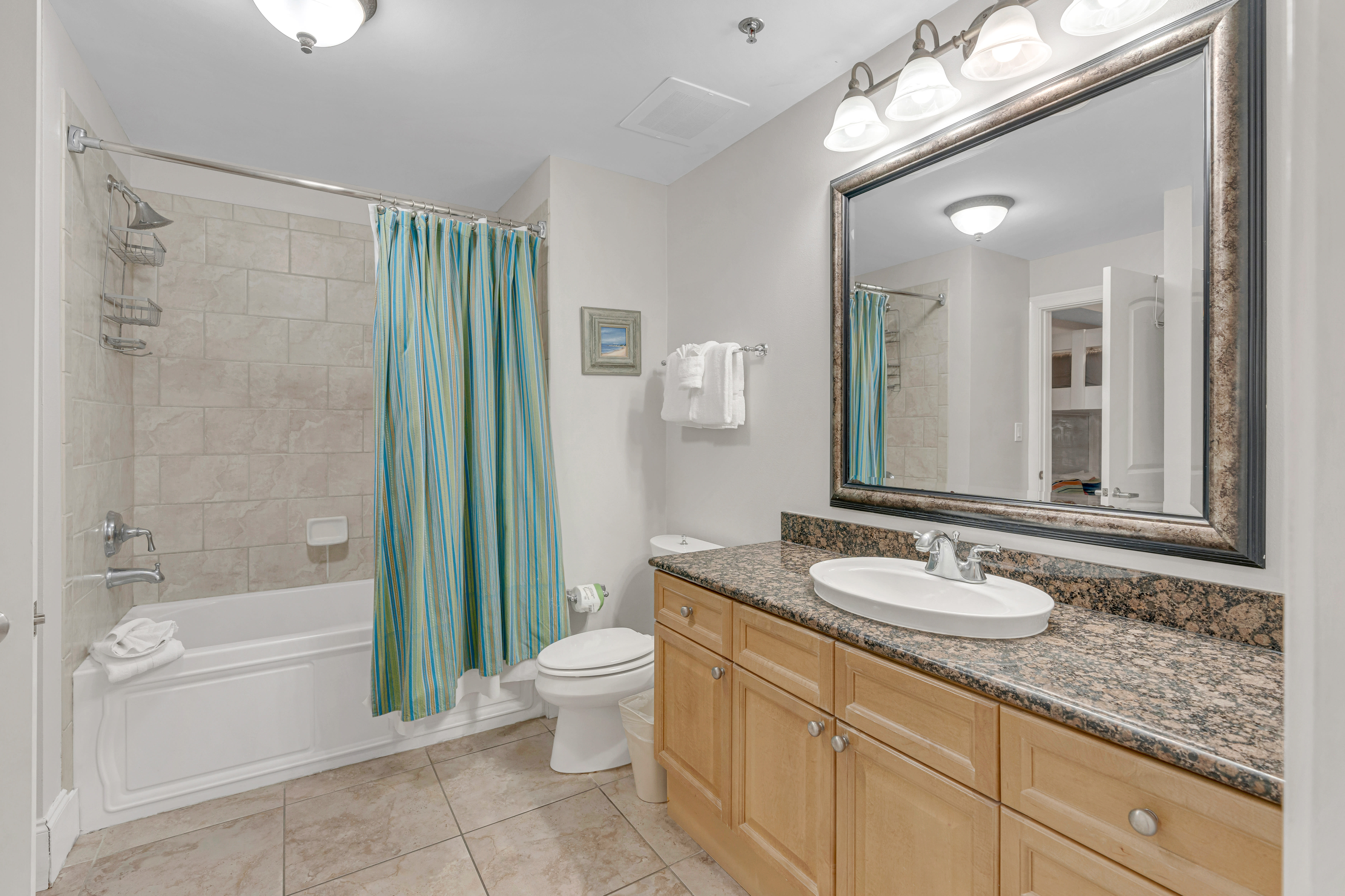 Full bathroom with tub and shower combo