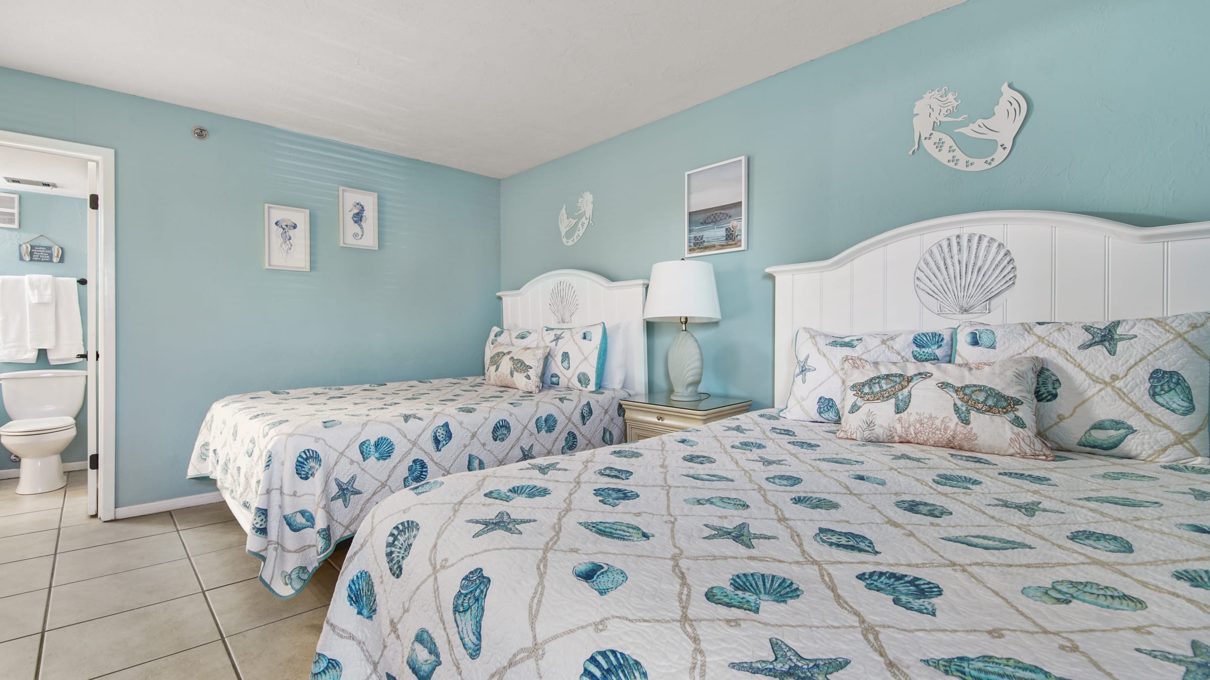 Spacious second bedroom with two queen beds. 