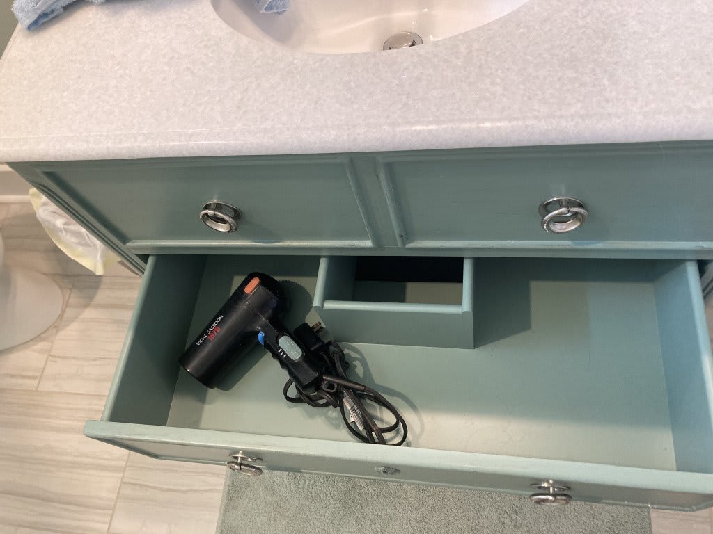 Hairdryers are under sinks in all the full baths!