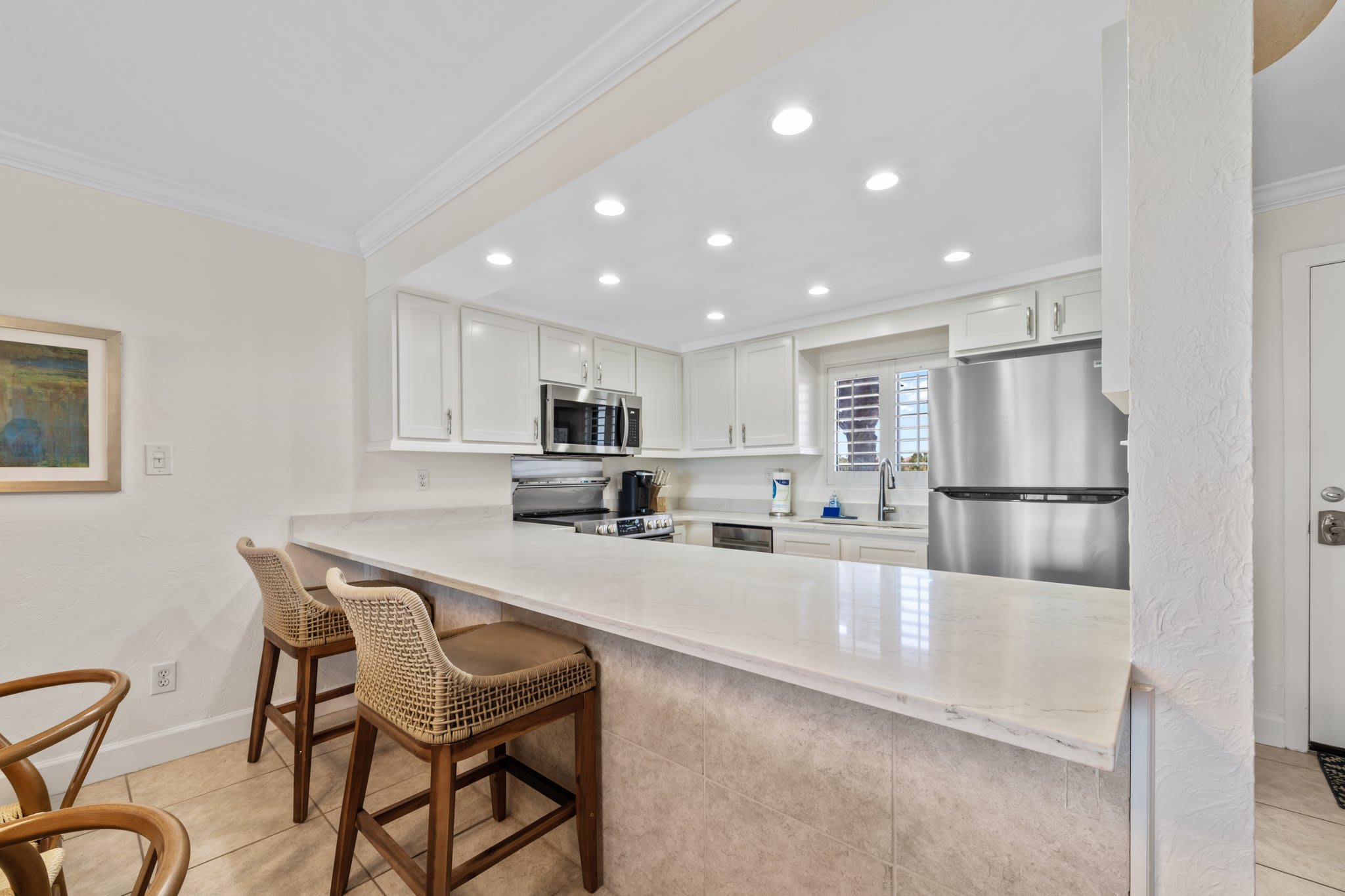 Extra seating at the kitchen counter.