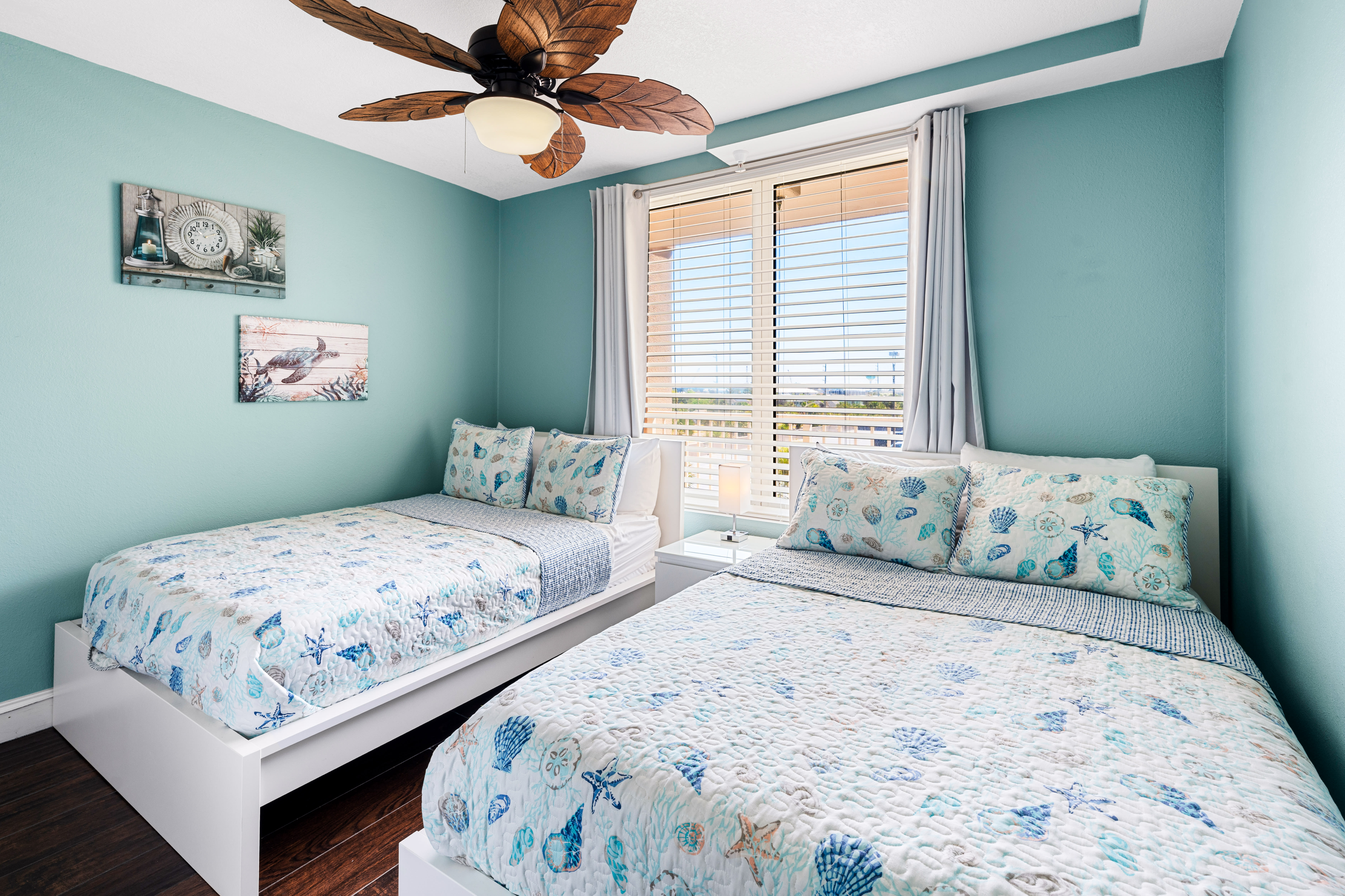 second bedroom with two full sized beds