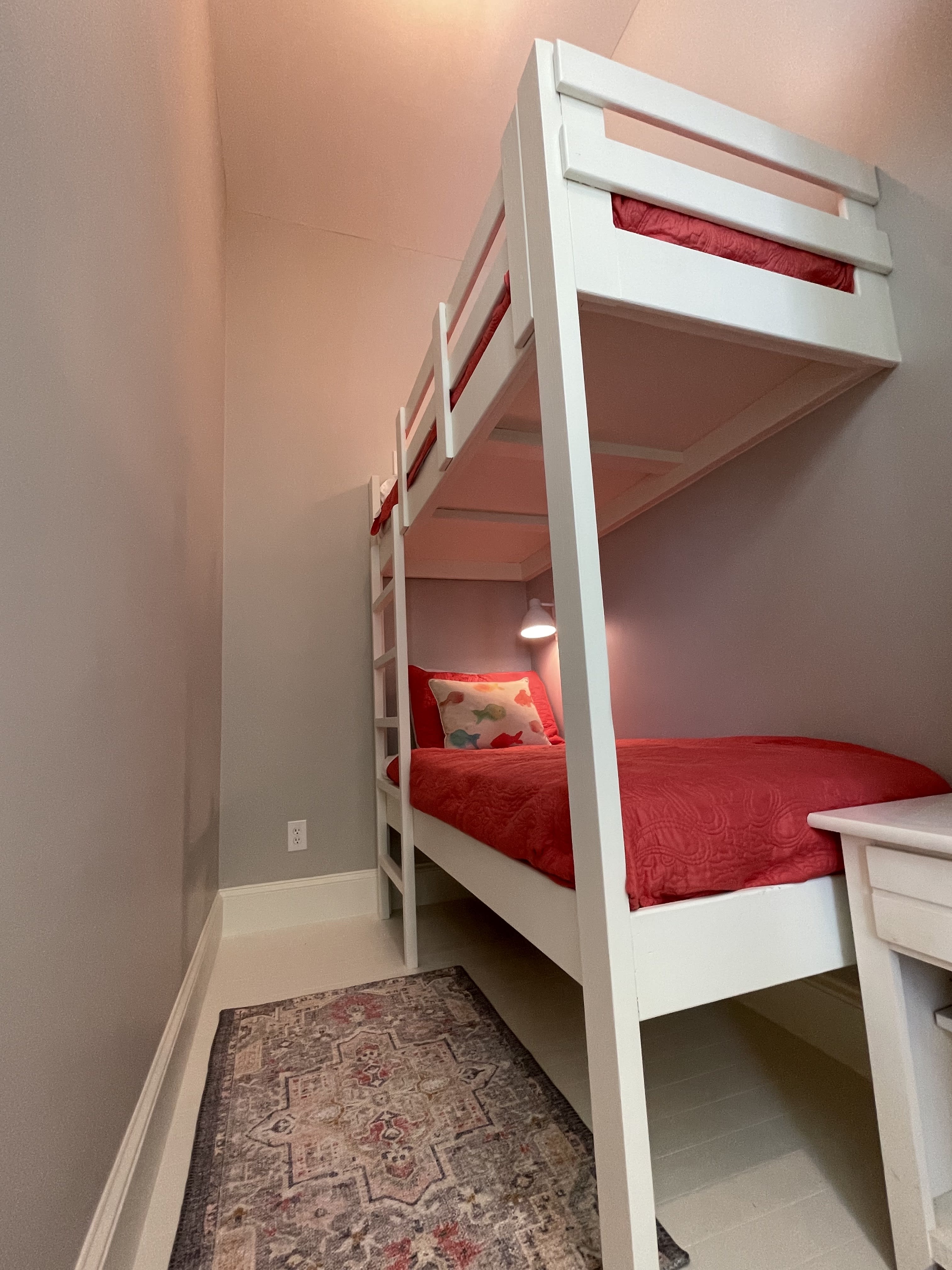 Upstairs bunk space, with door for privacy