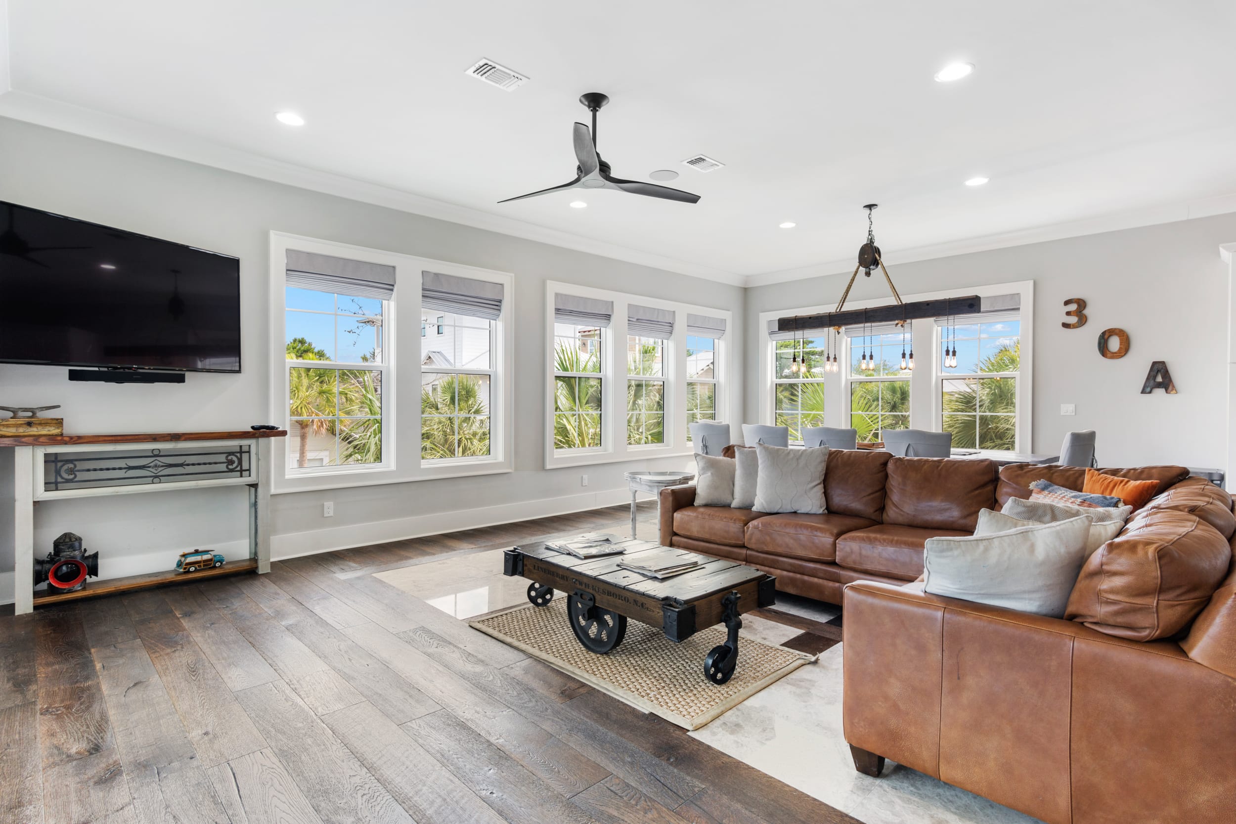 Living room boasts iconic, coastal view and smart tv