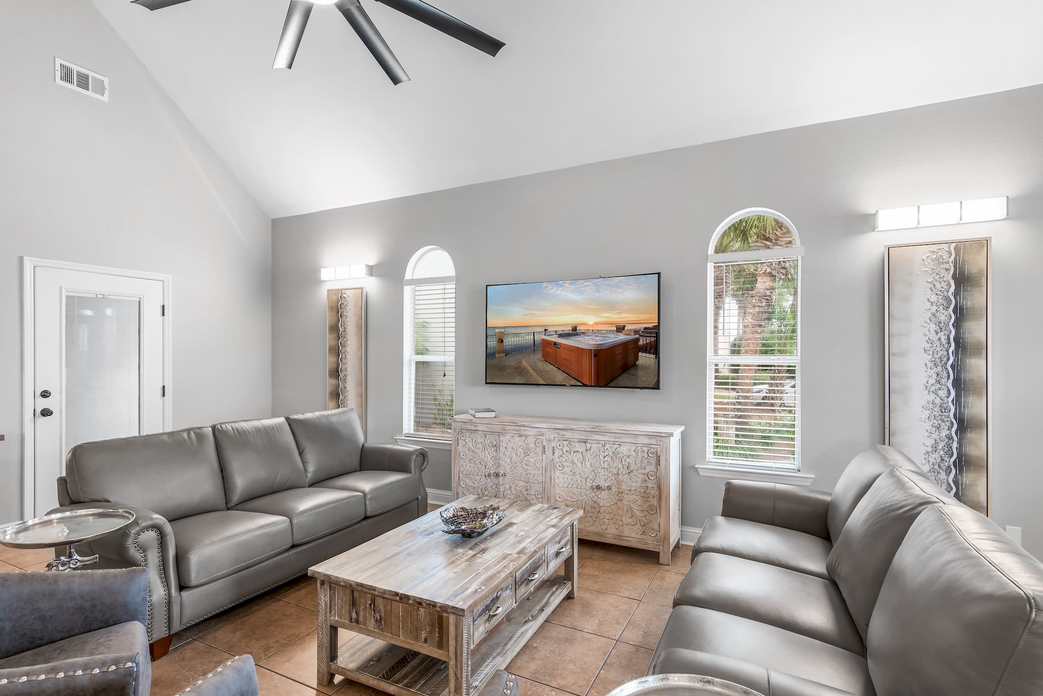 Living Room with 60" curved flat screen