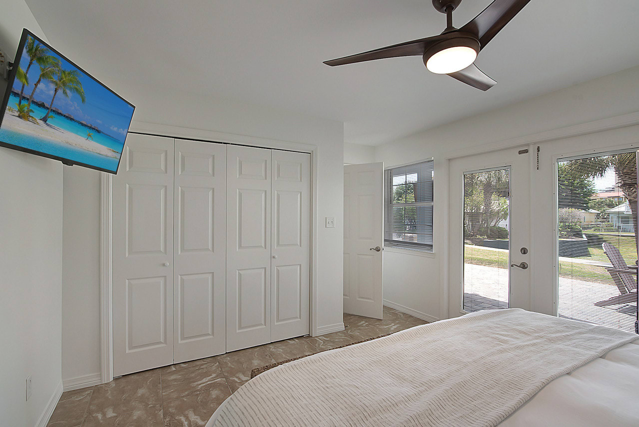 Lower level king with direct patio access.