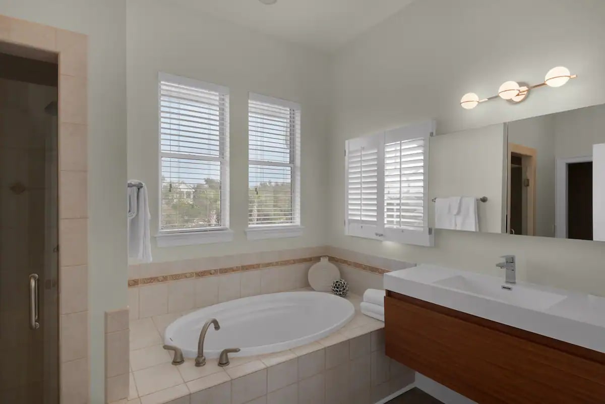 Aqua-23 Garden tub and floating vanity in king suite #3.