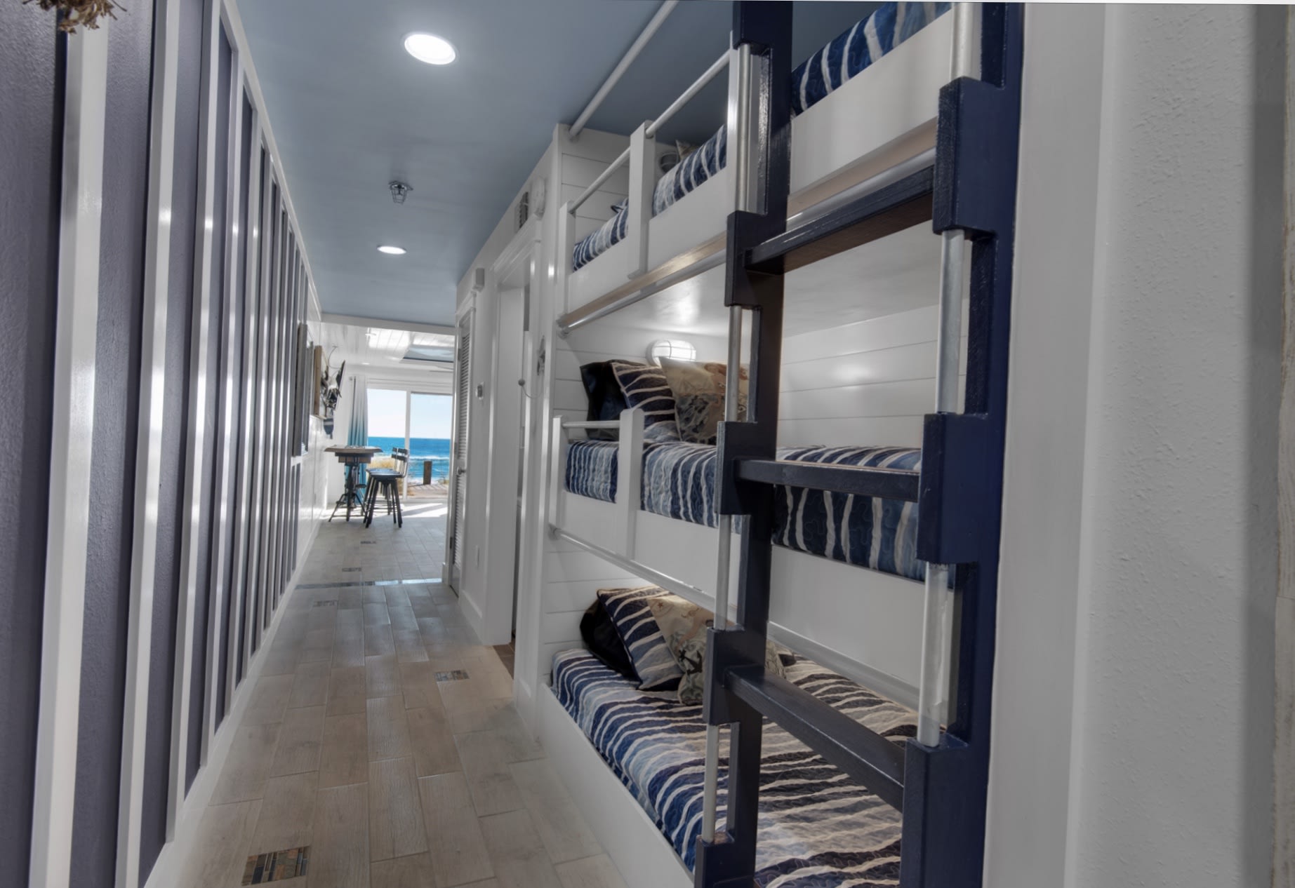Triple twin hall bunks with privacy curtains....who&rsquo;s getting the top bunk?