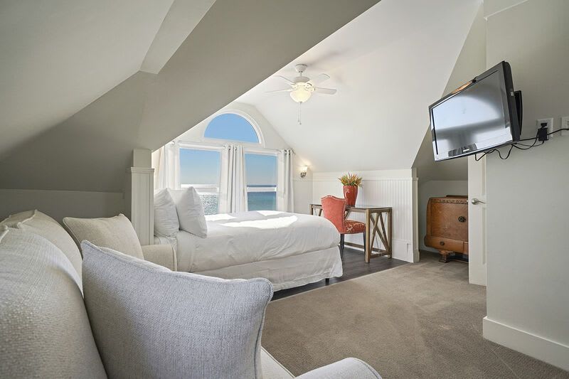 Upstairs room with queen bed and queen sleeper sofa