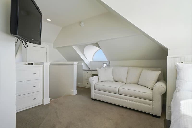 Upstairs room with queen bed and queen sleeper sofa