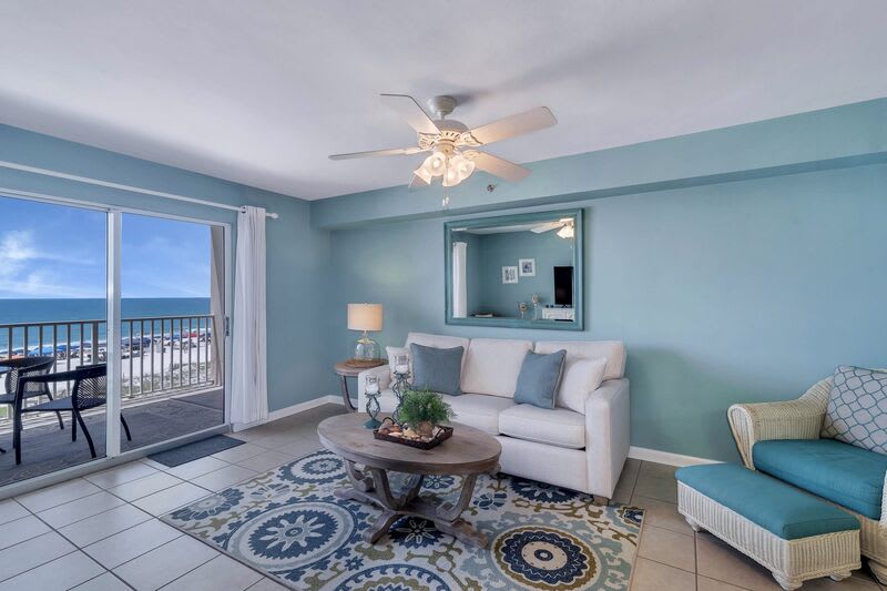 Spacious Living Room with views of the Beautiful Gulf of Mexico and access to Private Balcony and Full Size Sleeper Sofa