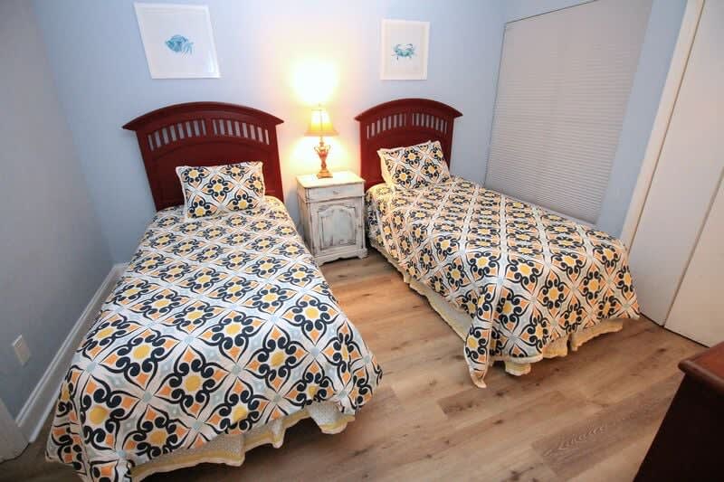 Twin beds in second bedroom