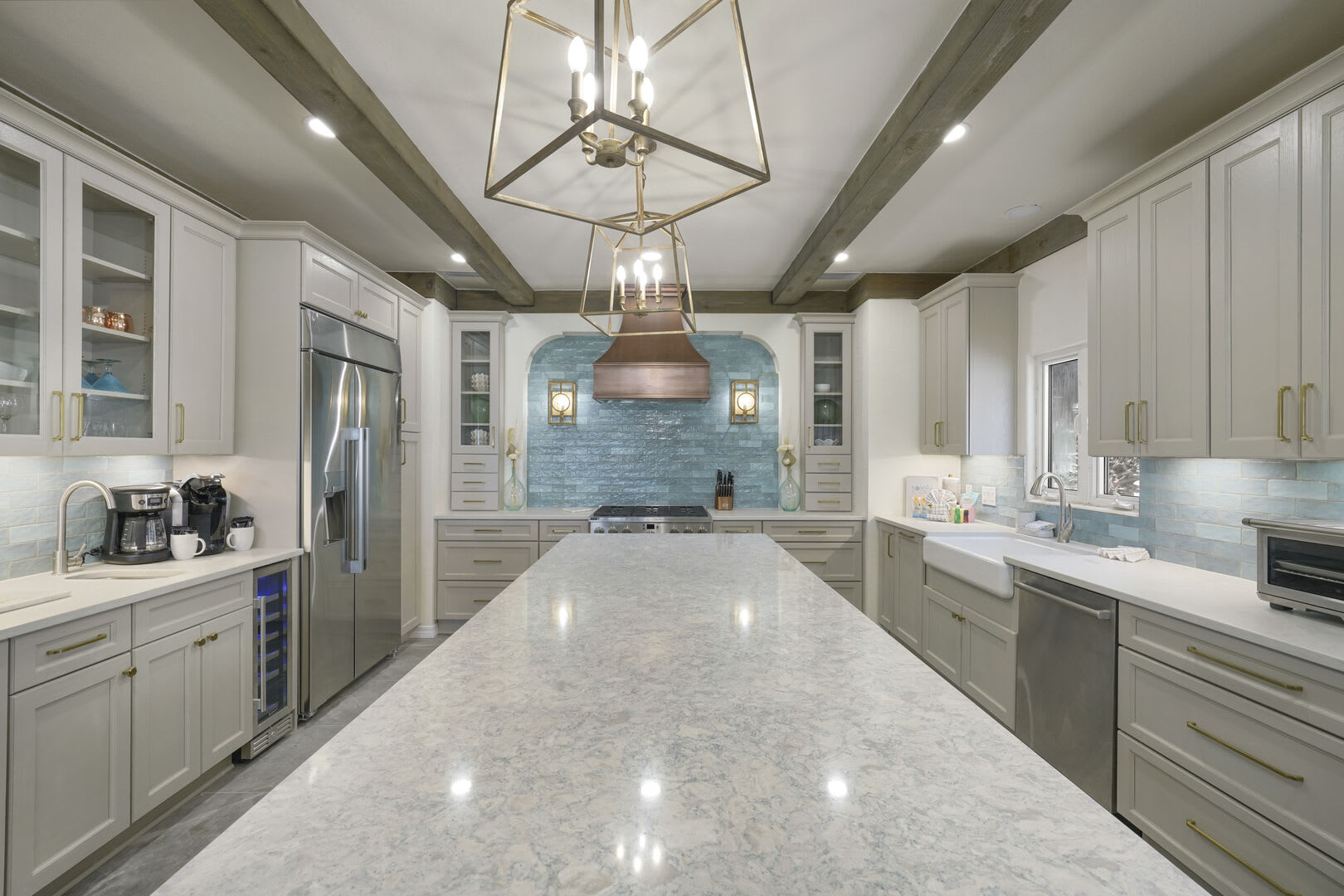 This island is massive with a ton of workspace and outlets underneath. Perfect for blenders and other appliances.