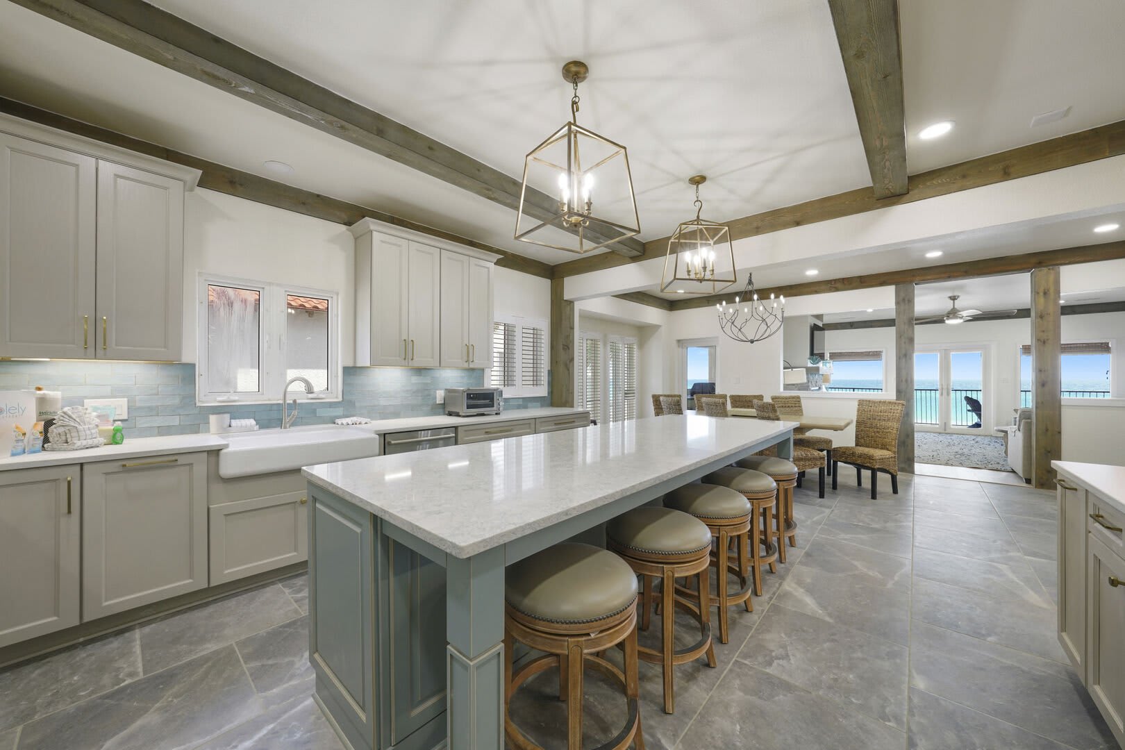 A view of the dining area from the kitchen into the new living area.