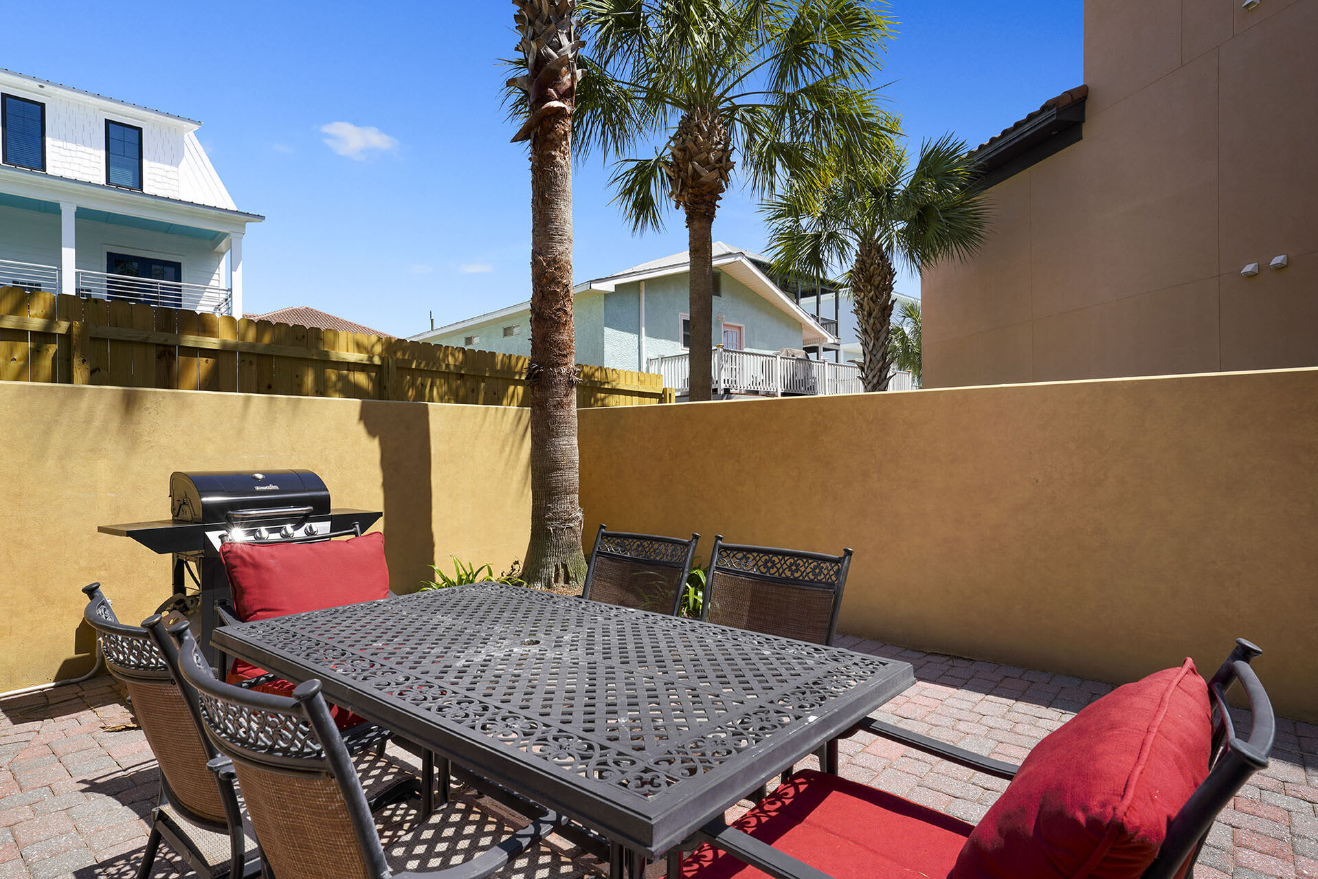 Sunset at Miramar - Vacation Rental Beach House in Gated Community with Community Pool at Emerald Water Village in Miramar Beach, Florida - Bliss Beach Rentals