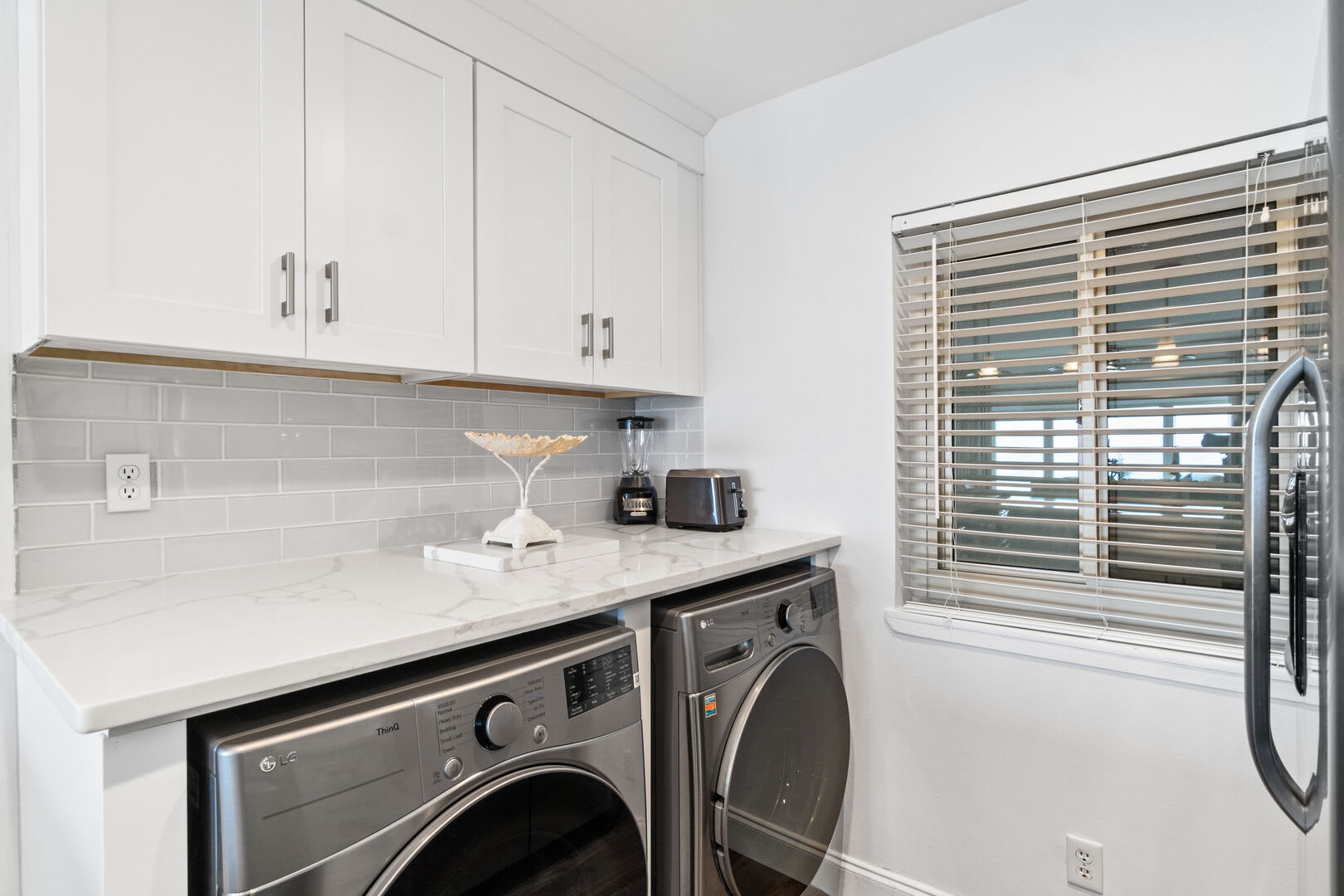 Laundry  easy access in the kitchen area.