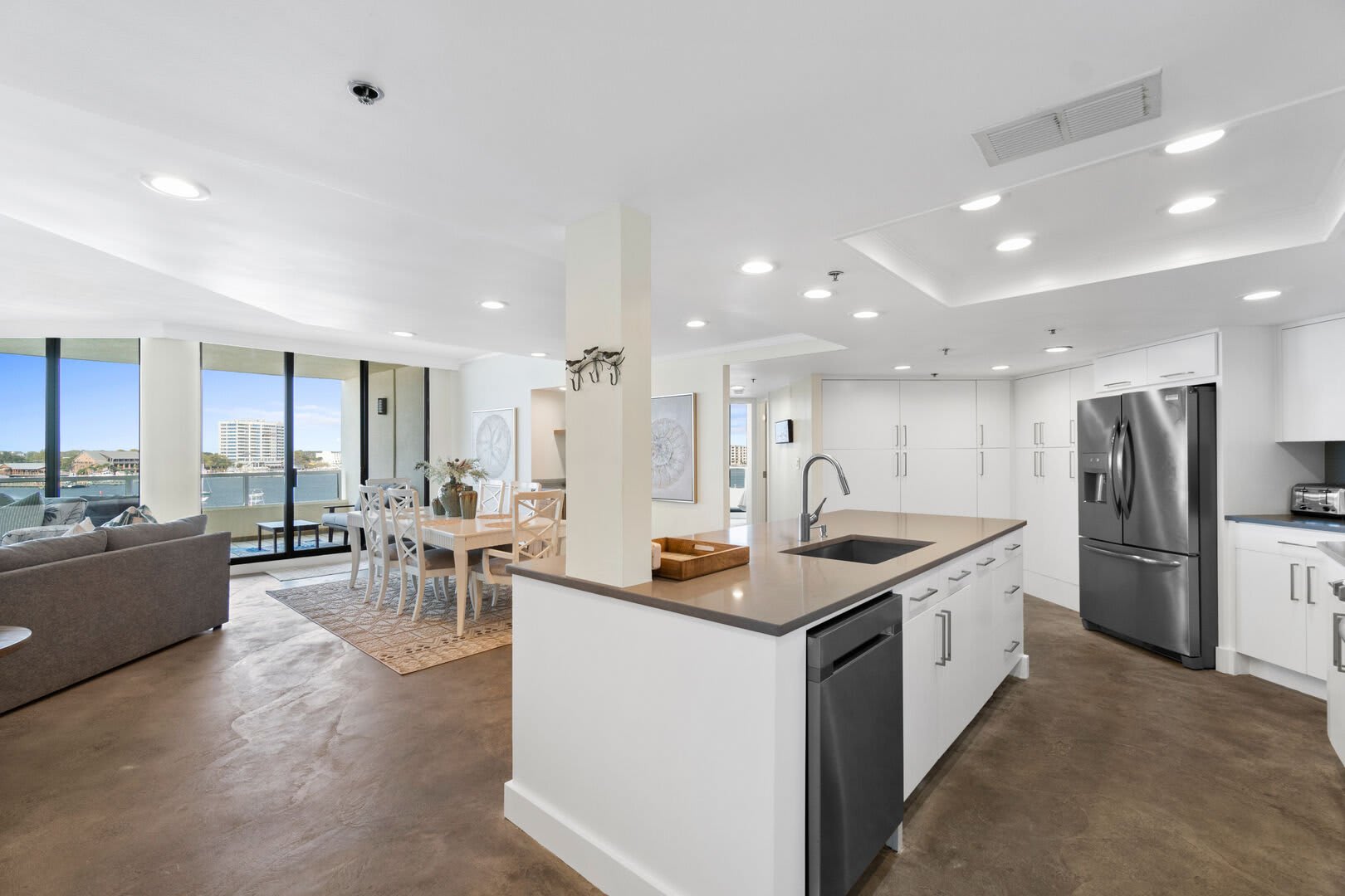 Amazing view from the kitchen. You will never get tired of it! And look at all those cabinets where you will find anything and everything you need to prepare and enjoy a meal or two.