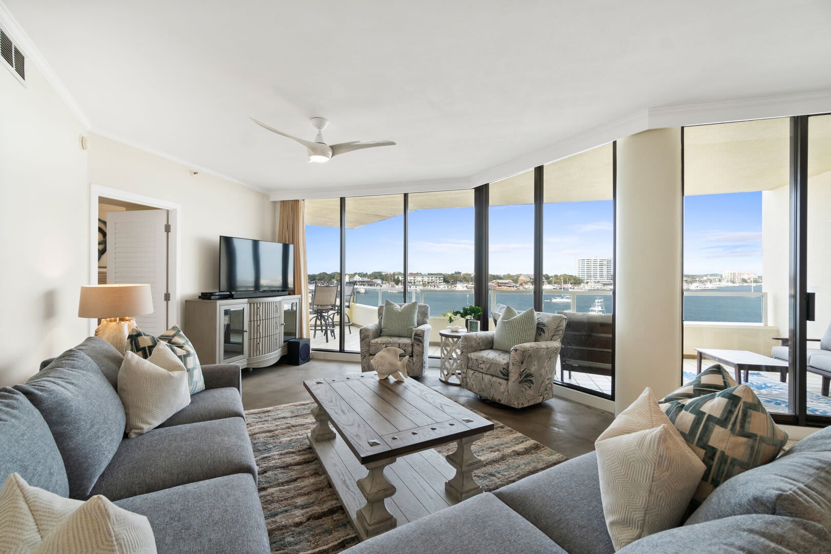 Comfortably accommodates 6 to 8 guest on the large cushy sofa and 2 swivel club chairs to take in the gorgeous harbor view or catch up on your fav shows and news with the big screen smart TV with cable.