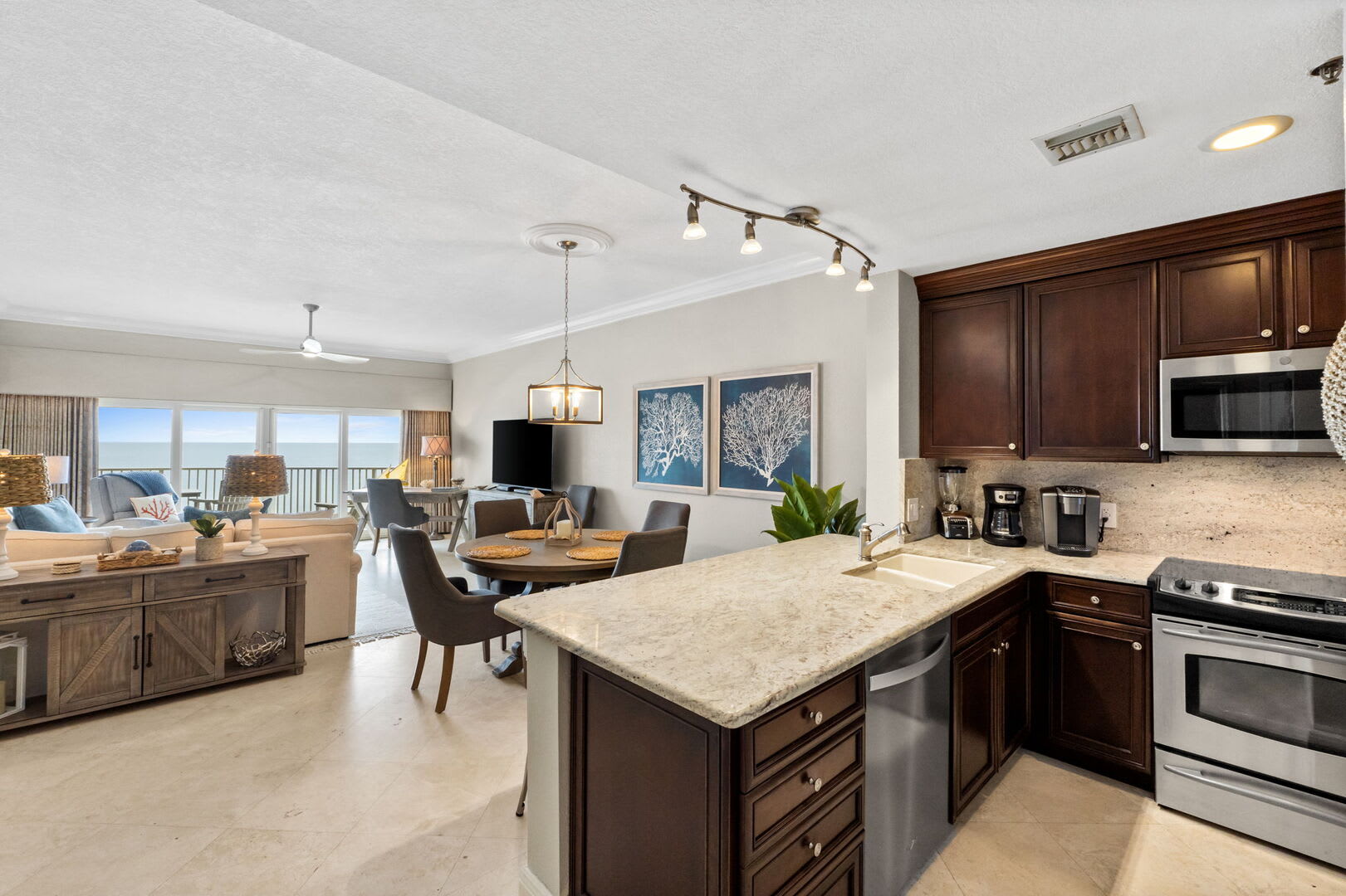 Spacious kitchen breakfast bar for your fav beverage or snack or just good conversation.